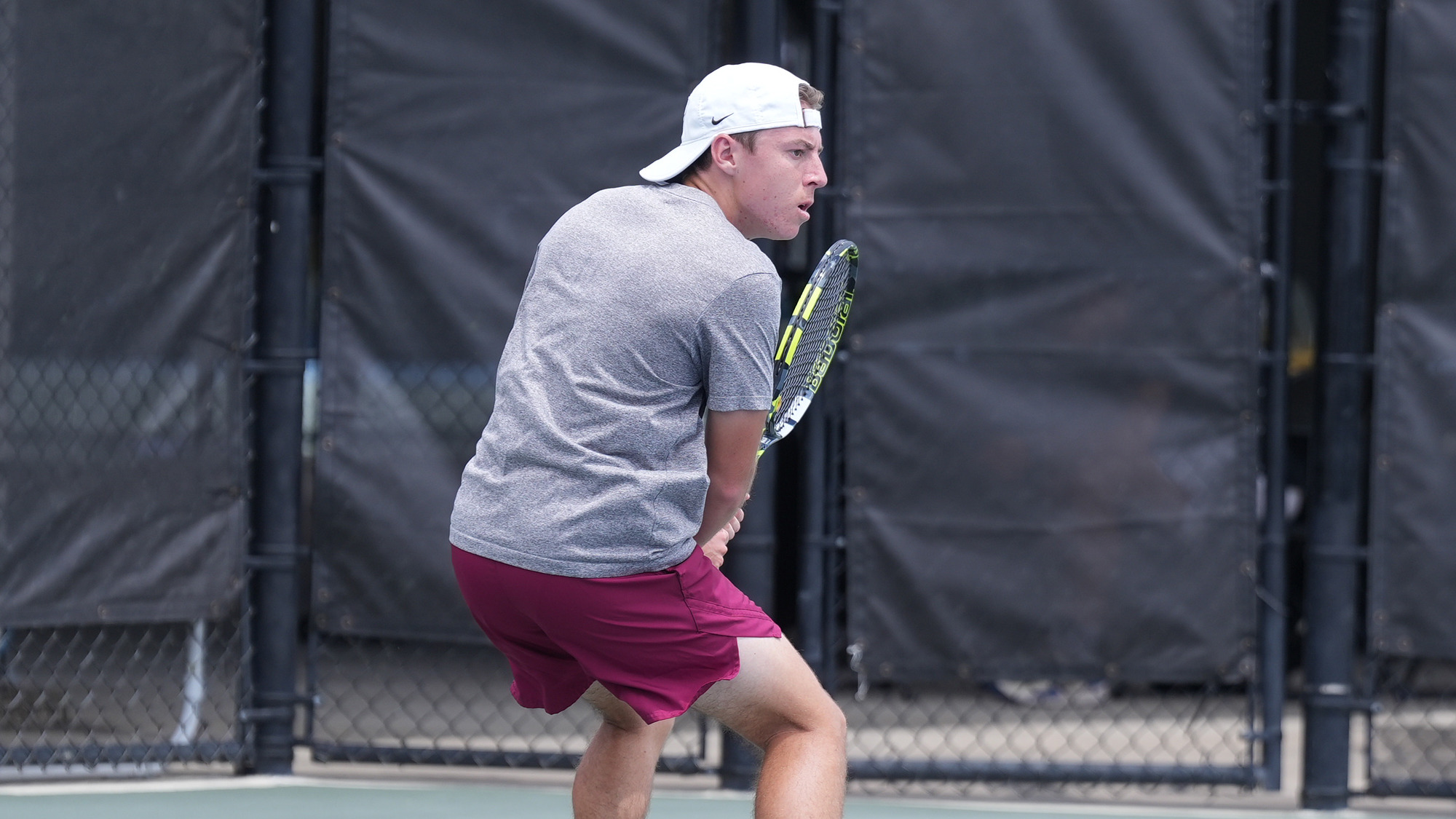 Will Lokier looks to hit a backhard vs. Saint Joe's