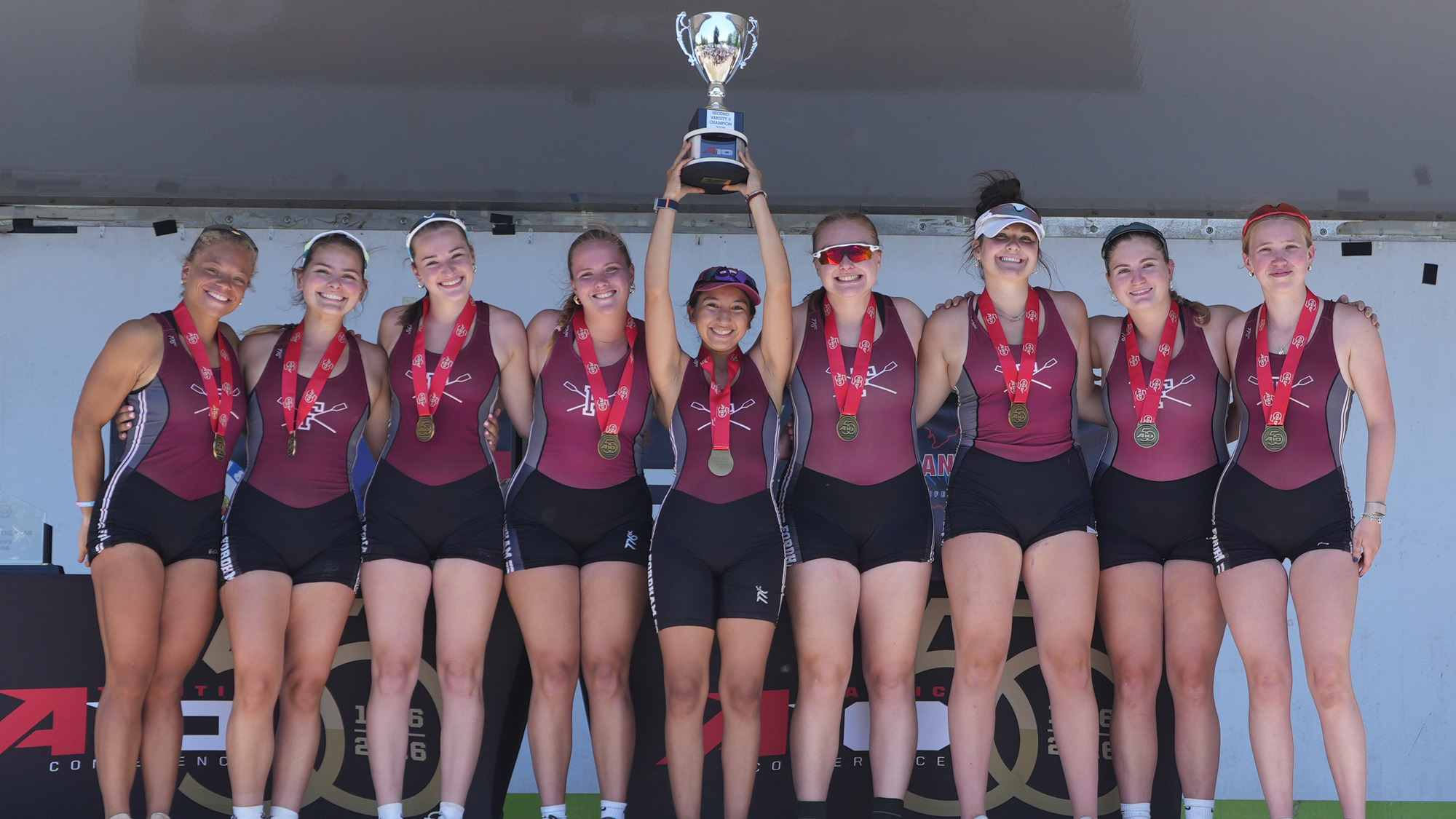 The Varsity 8 with the second place trophy 