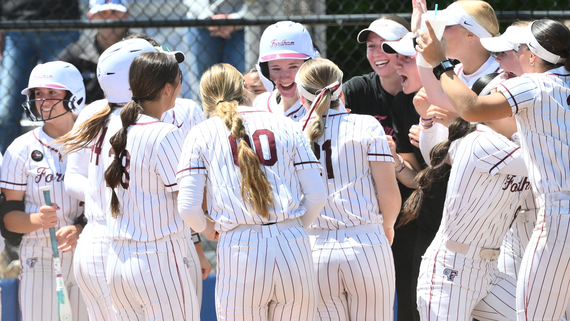 The Rams celebrate Victoria Klimaszewski's three-run home run