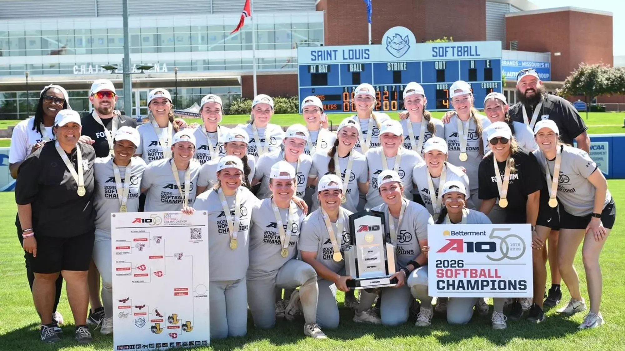 Softball with the 2026 Atlantic 10 Championship trophy 