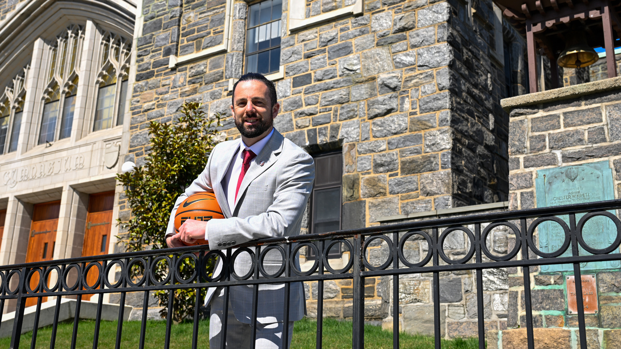 Head coach Neil Harrow in front of the Rose Hill Gym
