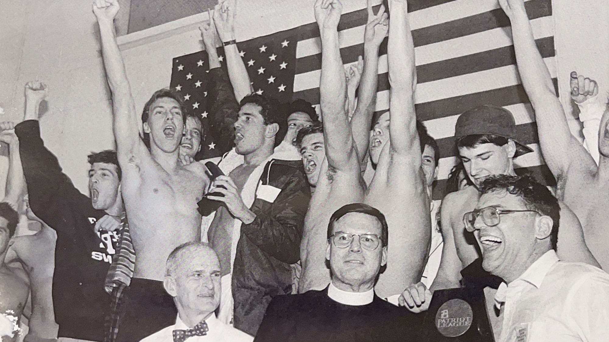 The 1990-91 men's swimming team celebrates its Patriot League title