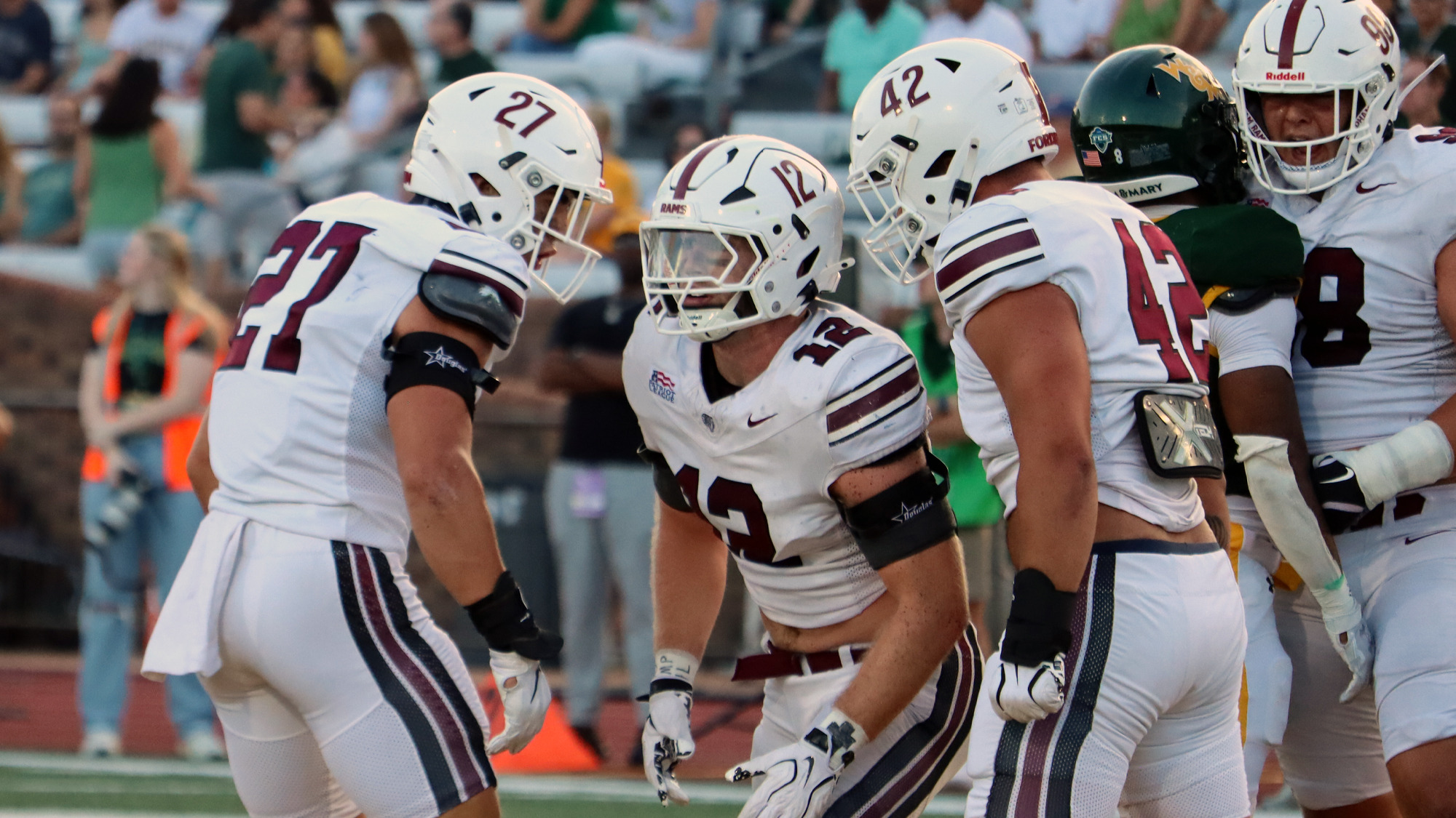 The Rams celebrate a third down stop at William & Mary