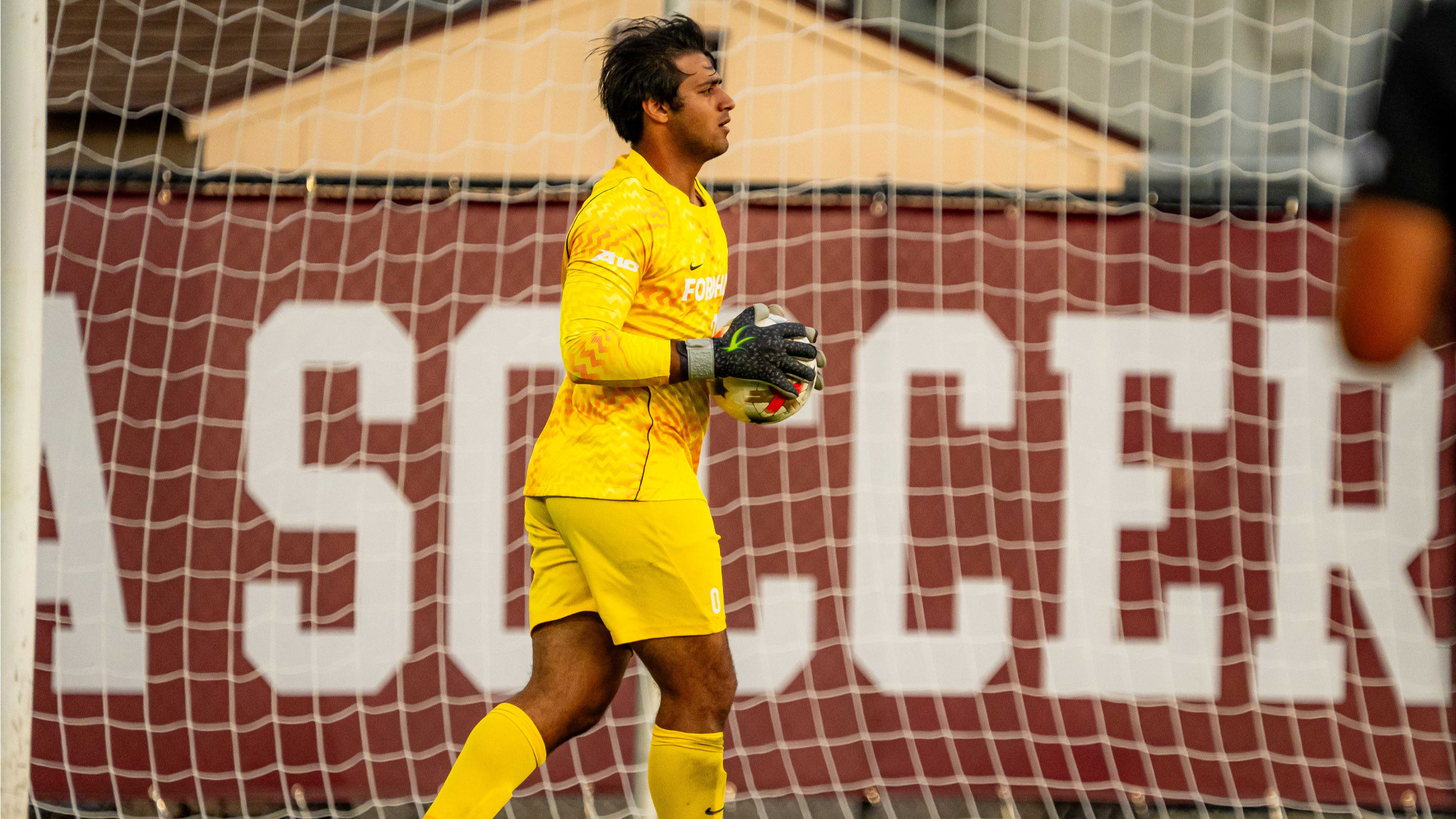 Keeper Shayon Kashi with the ball
