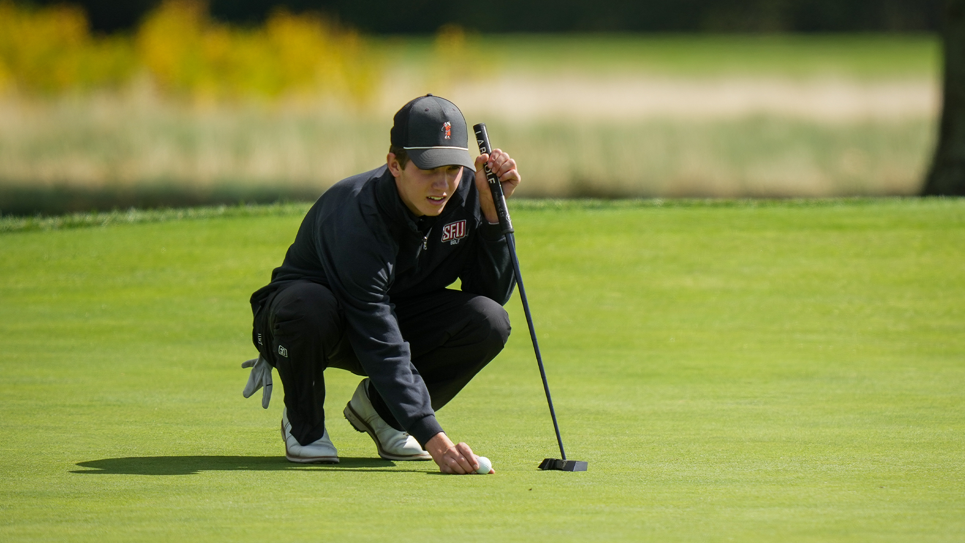 Trent Meyers lines up putt