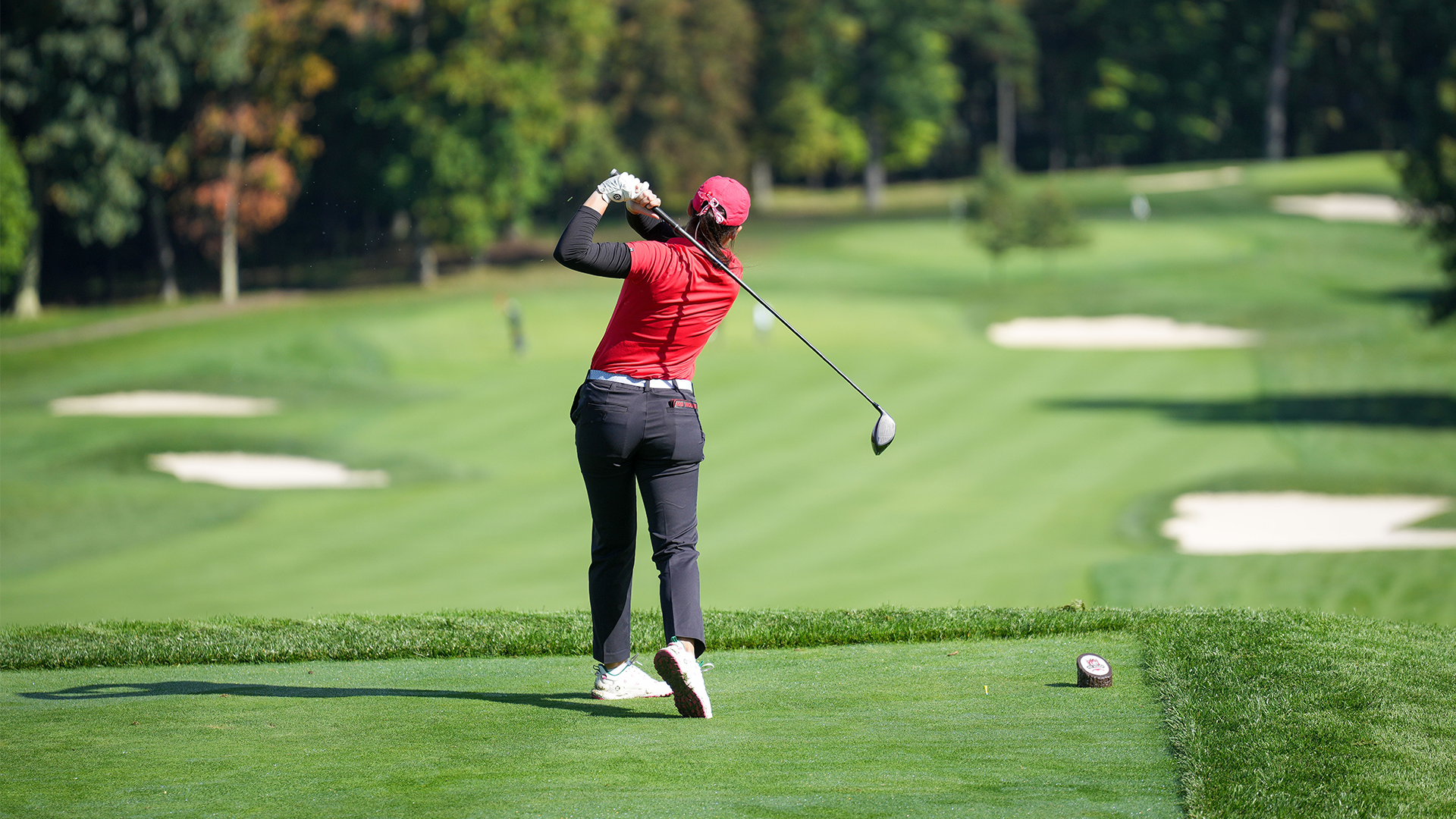 Sarah Miller teeing off