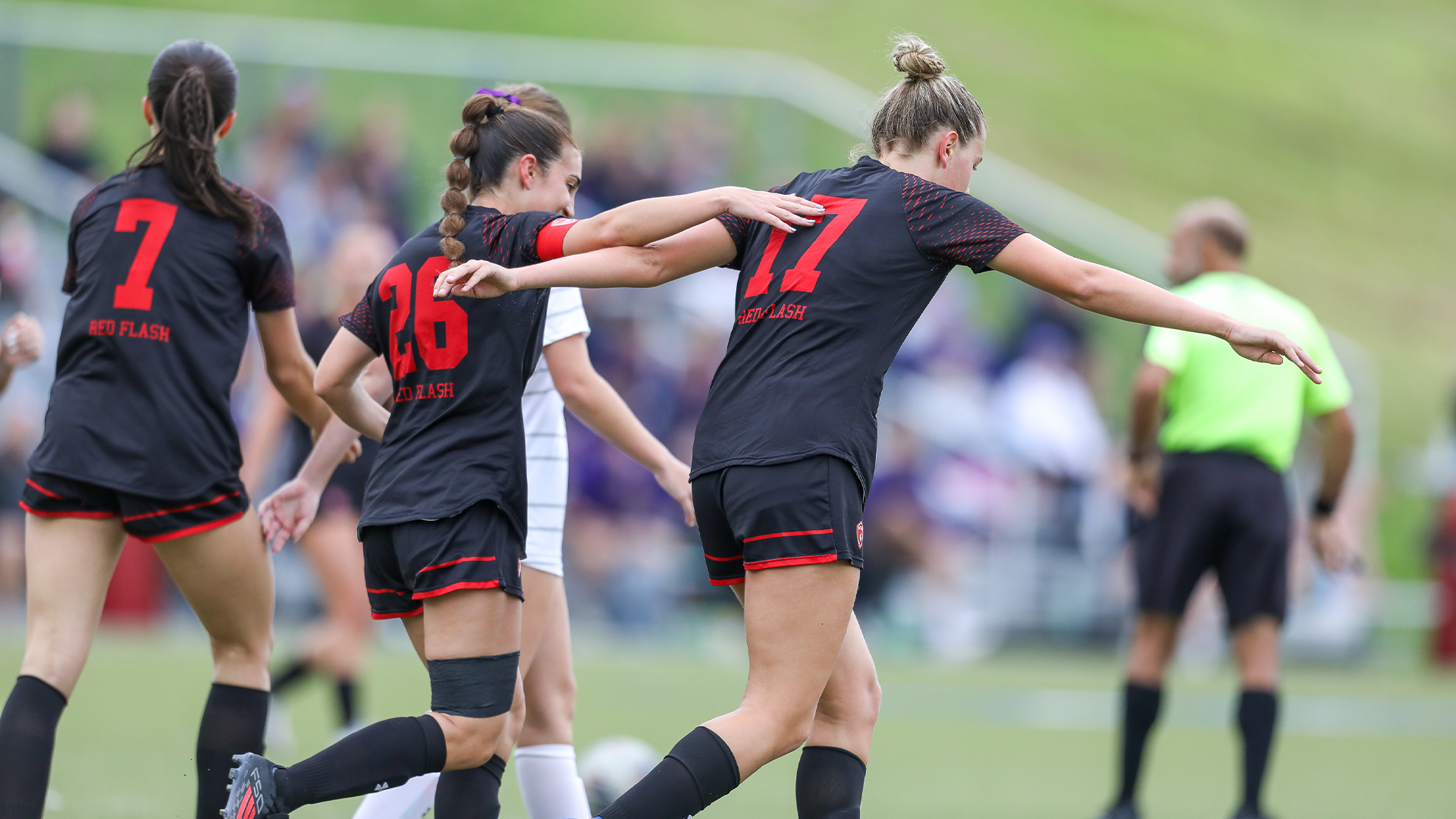 Paino and Baker celebrating a goal