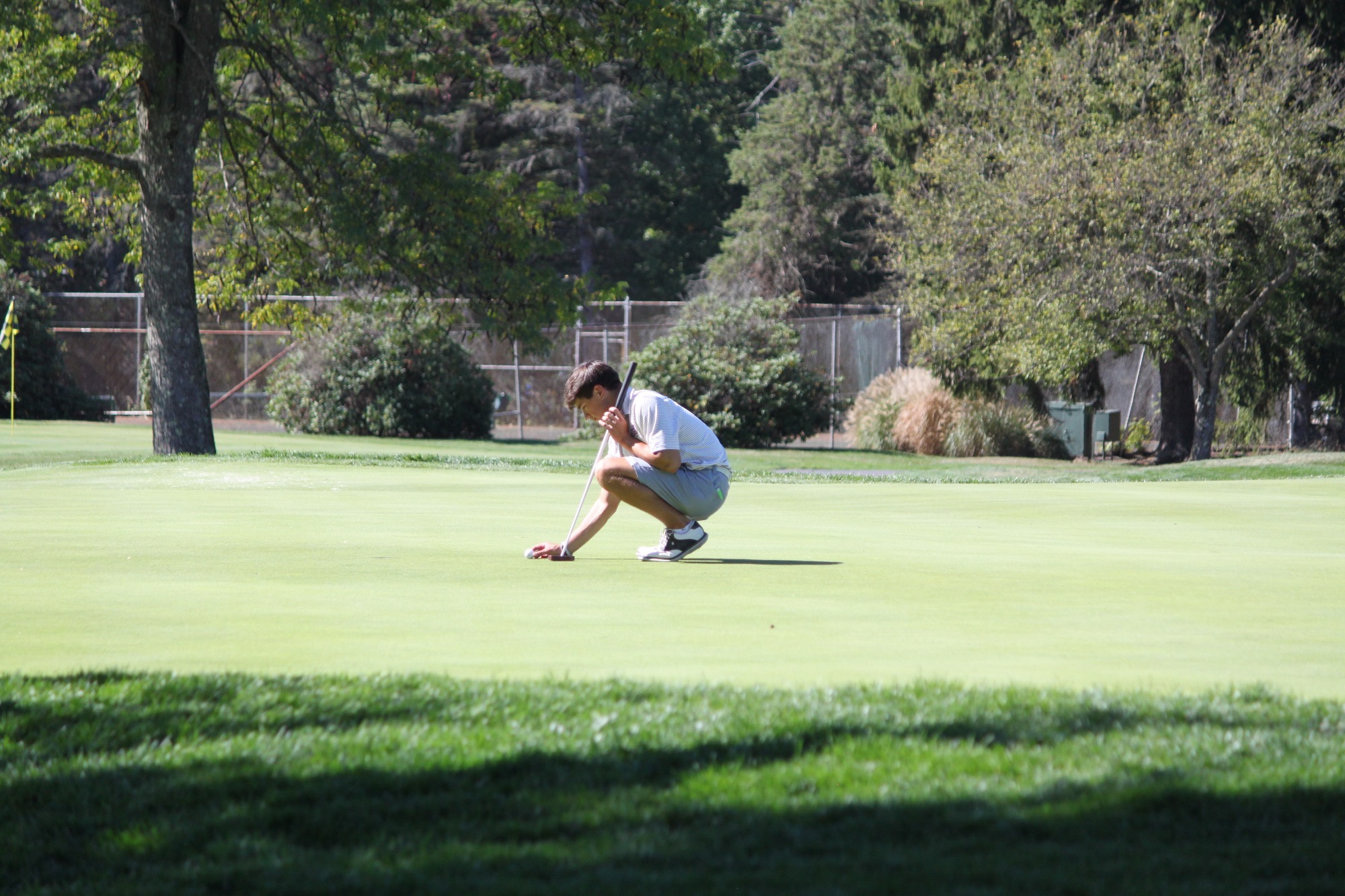 Bryce Van Horn Lining Up Putt