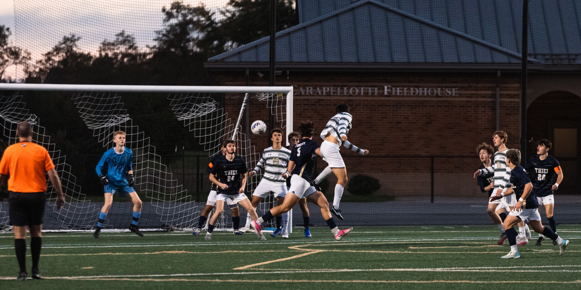 Anthony Venditti puts a header toward the goal.