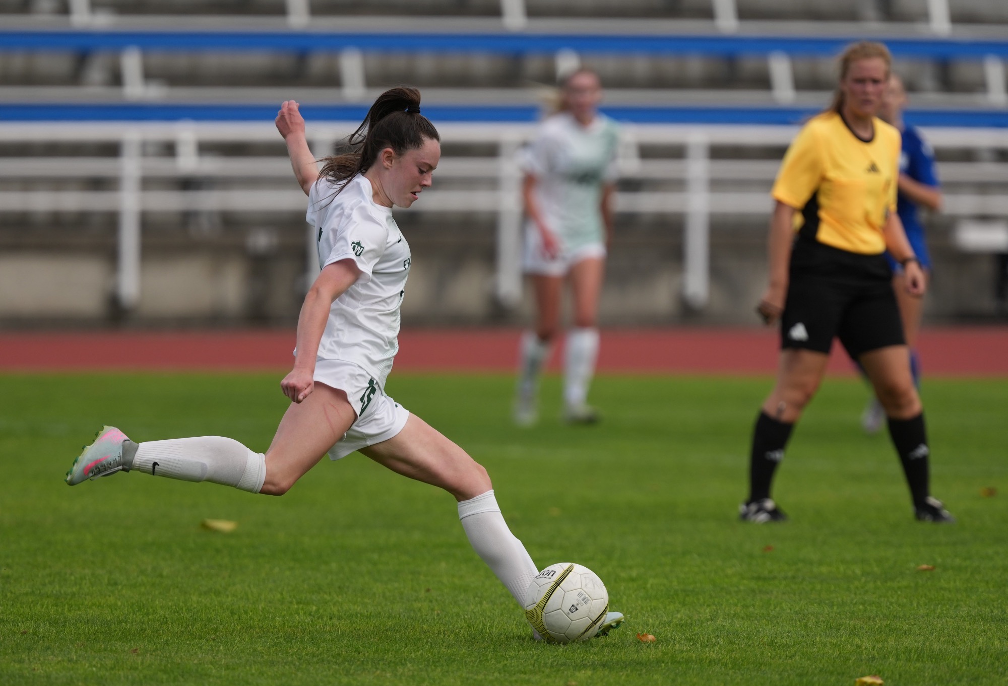 Kyla Kerr plays the ball forward