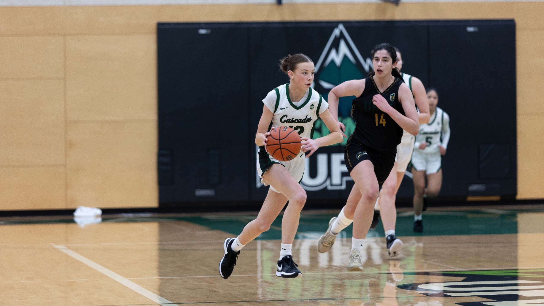 Ella Bohn runs with the ball against UNBC