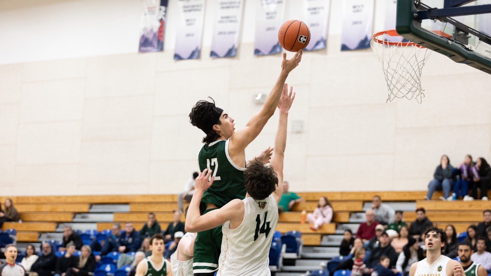 Marcus Flores lays it in against UNBC