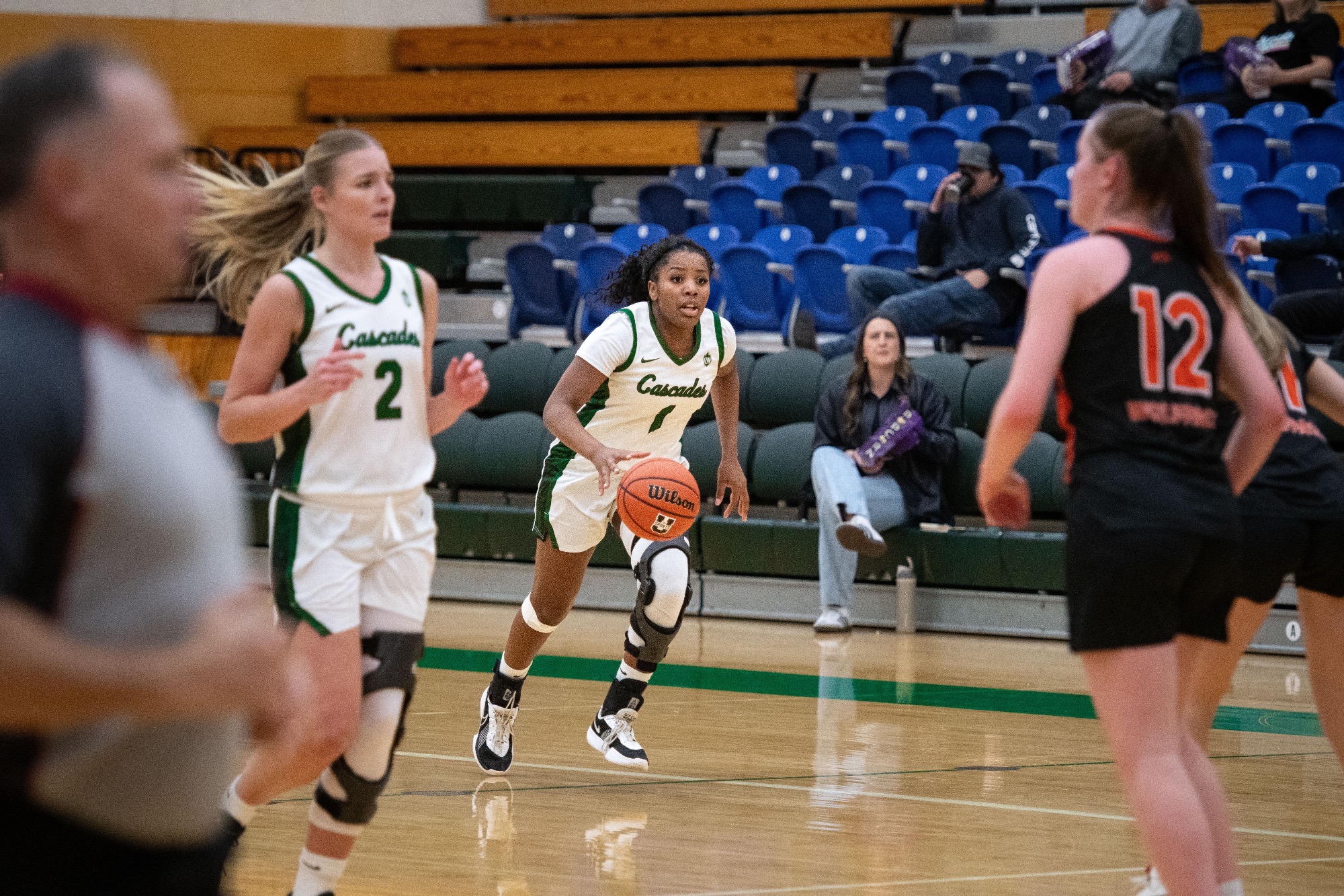 Fania Taylor heads up the court against TRU