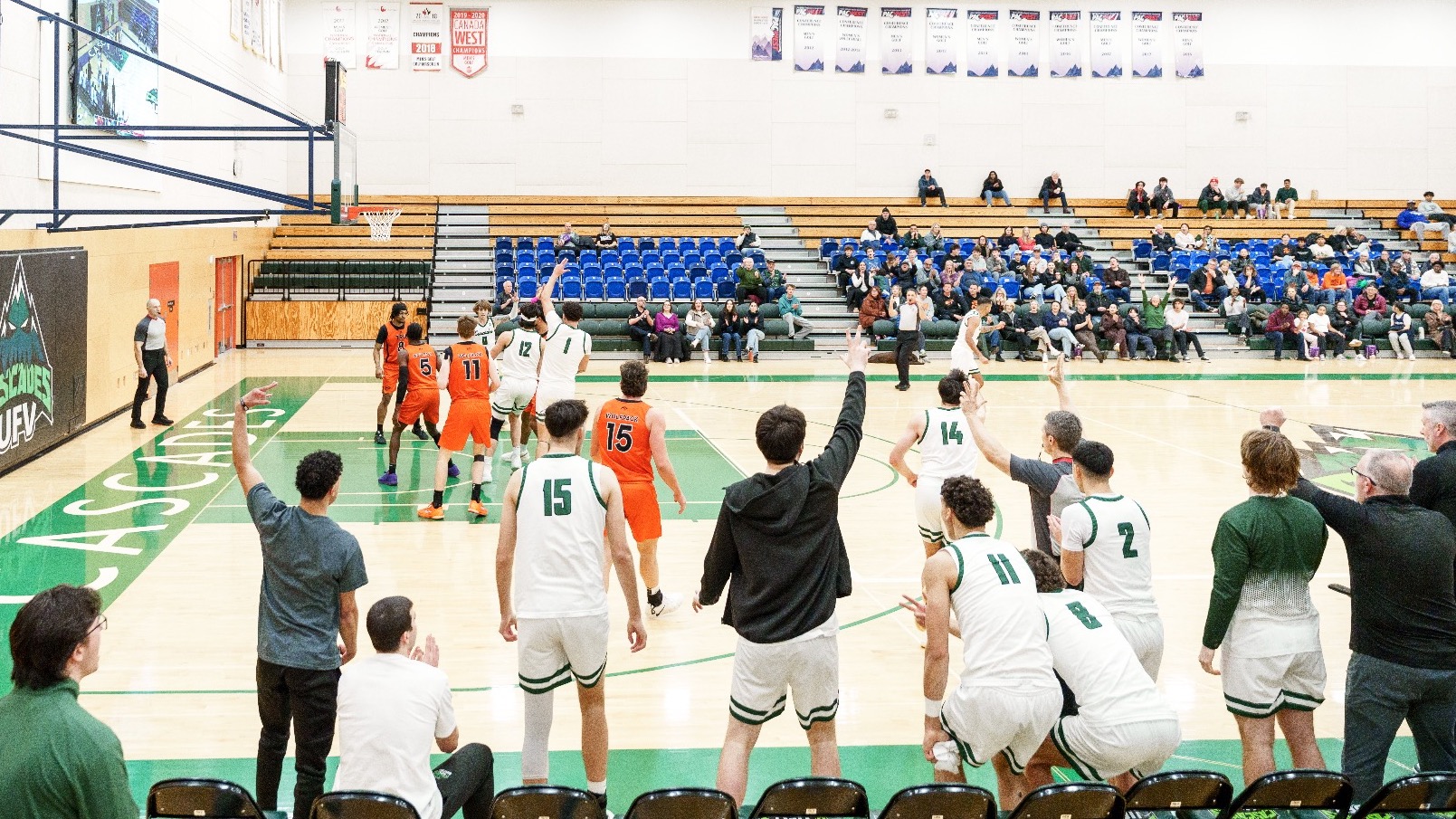 Cascades bench celebrates after a bucket
