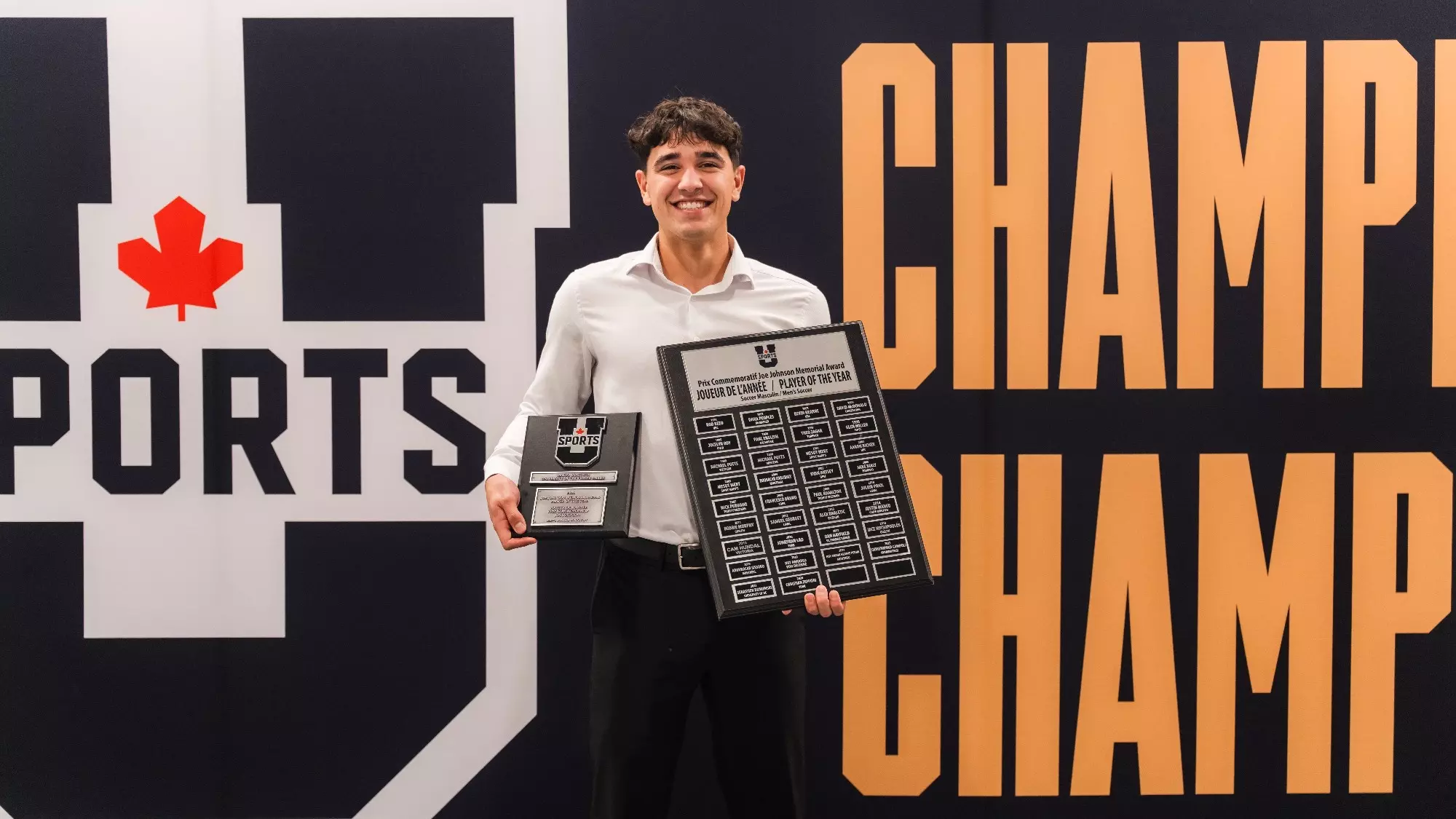 Mateo Brazinha with his national player of the year award