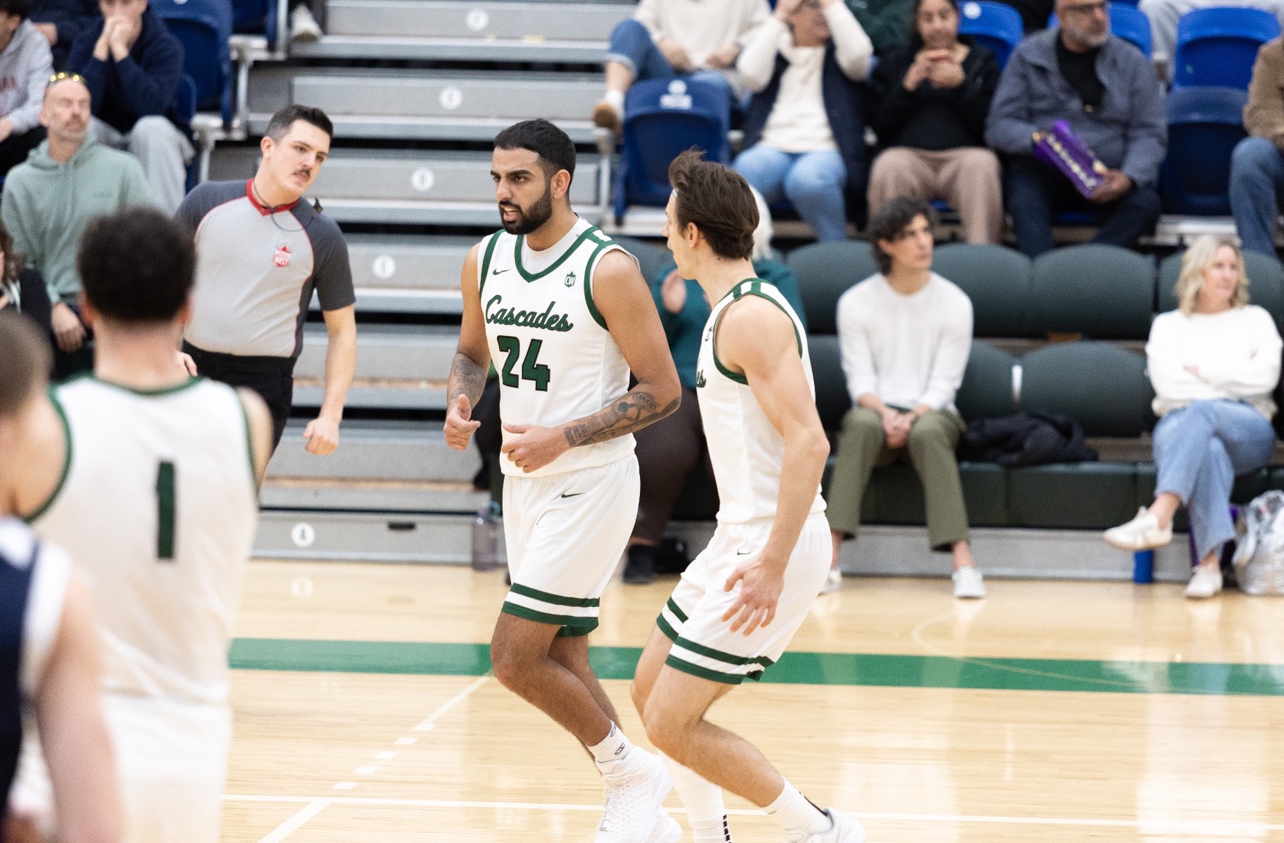 Dilveer and Jaylen celebrate after a three