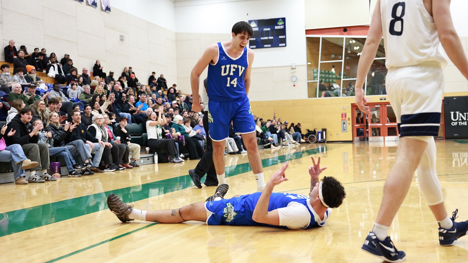 Dario and Izzy vs UBC in retro jerseys