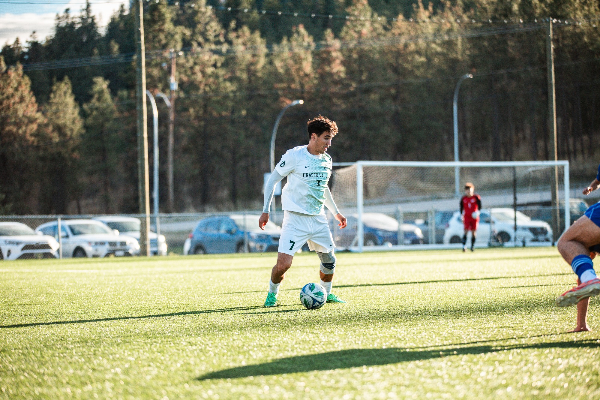 Mateo Brazinha carries the ball against UBCO