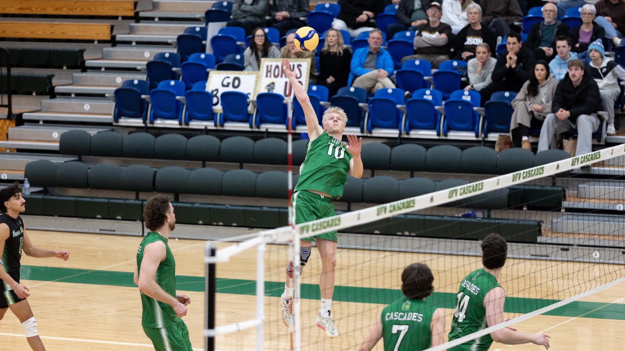 Hudson Brandsma hits the ball against Manitoba
