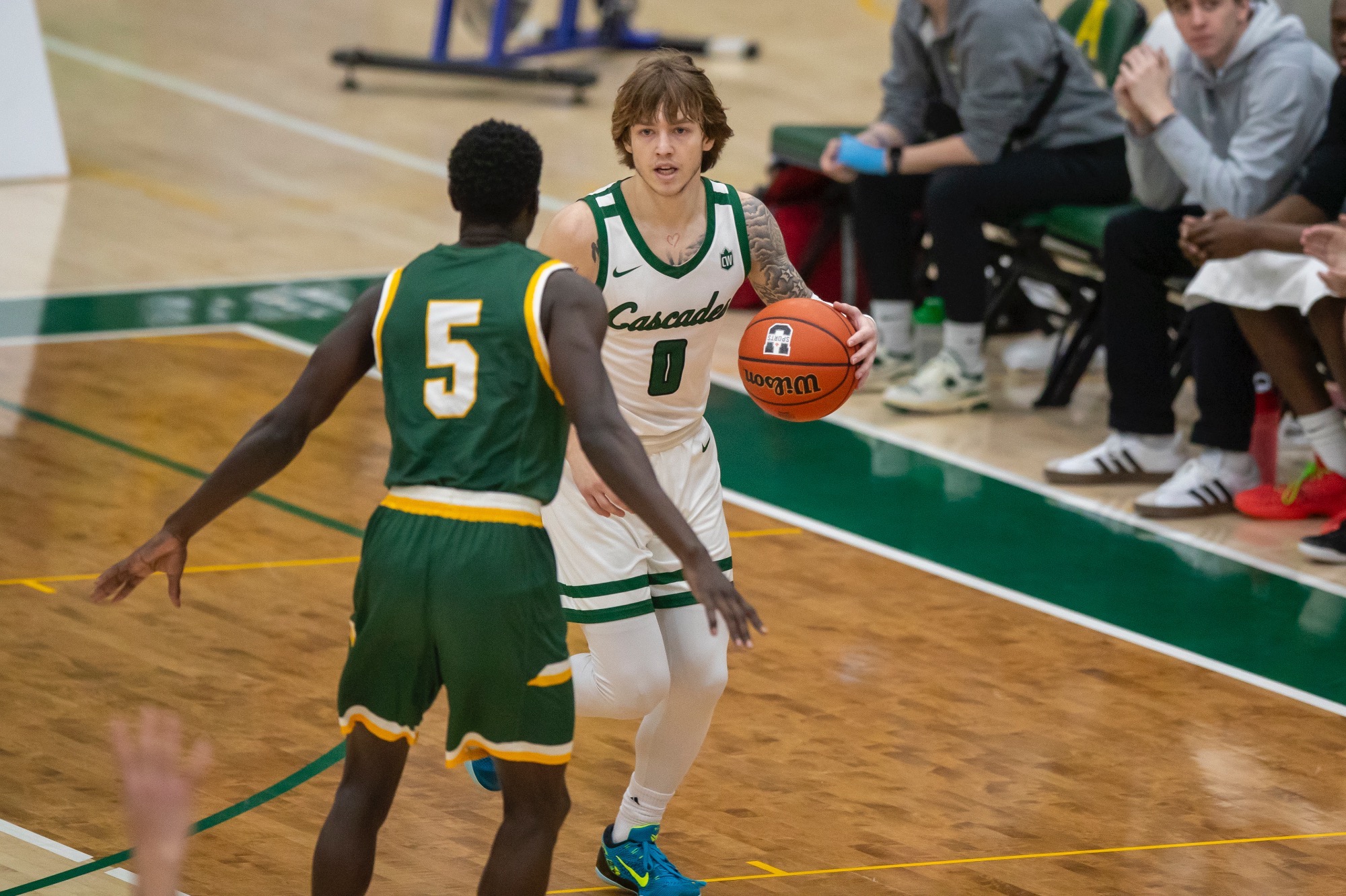 Bennett O'Connor with the ball against Alberta