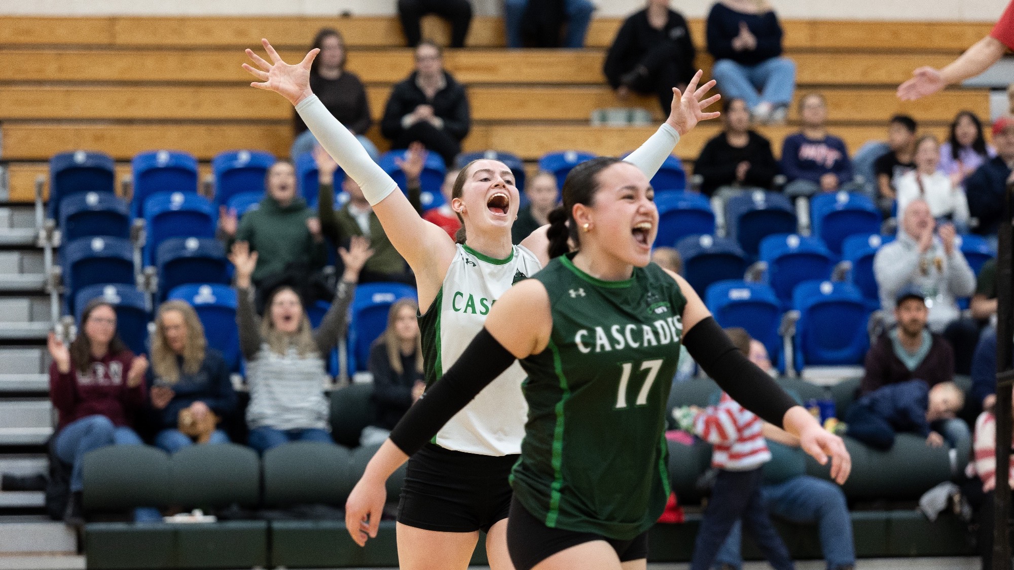 Lauren Attieh and Makenna Hudson celebrate after match point against MacEwan in game one of the Canada West Play-in