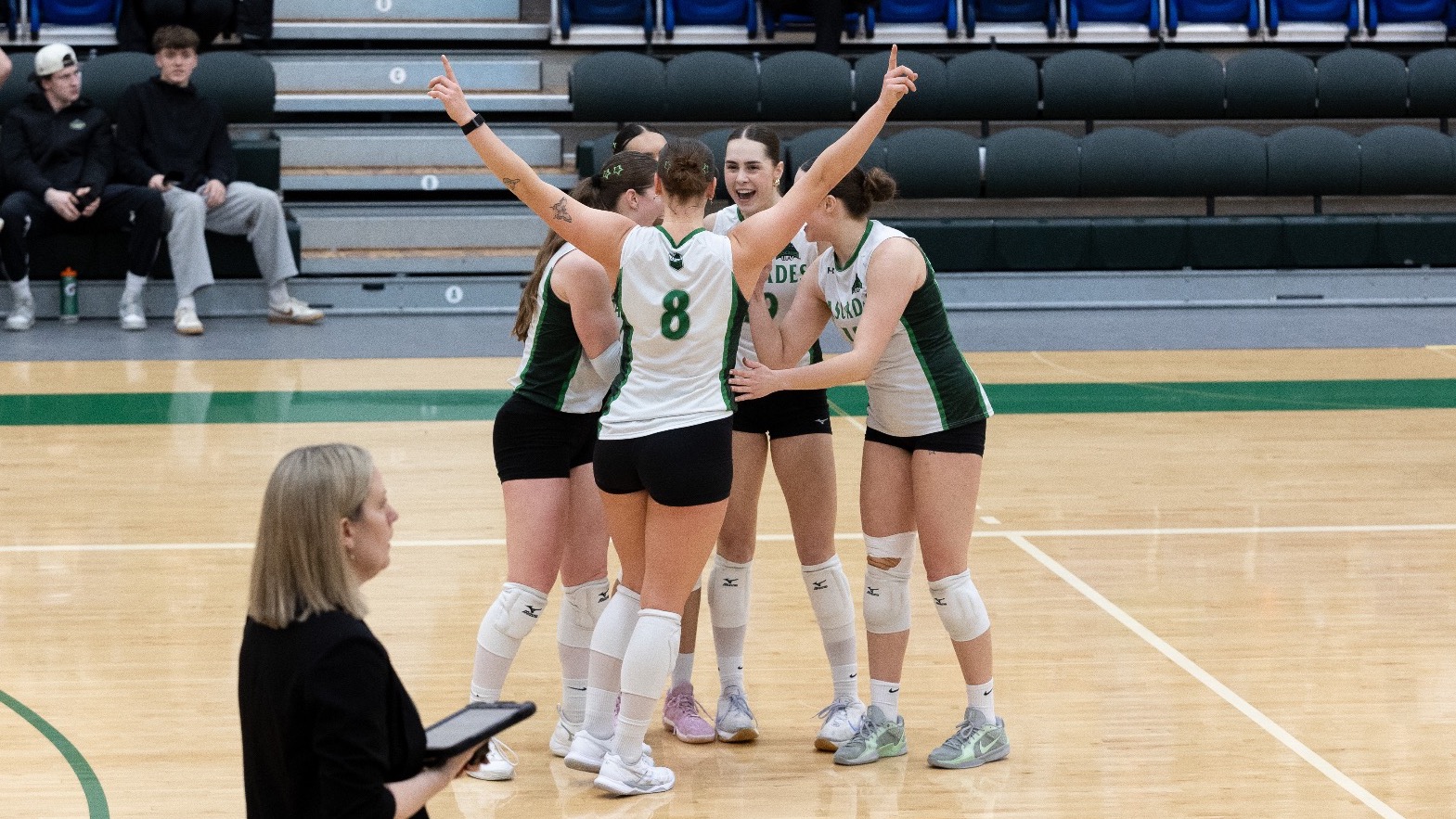 Cascades celebrate after a point in game three against MacEwan