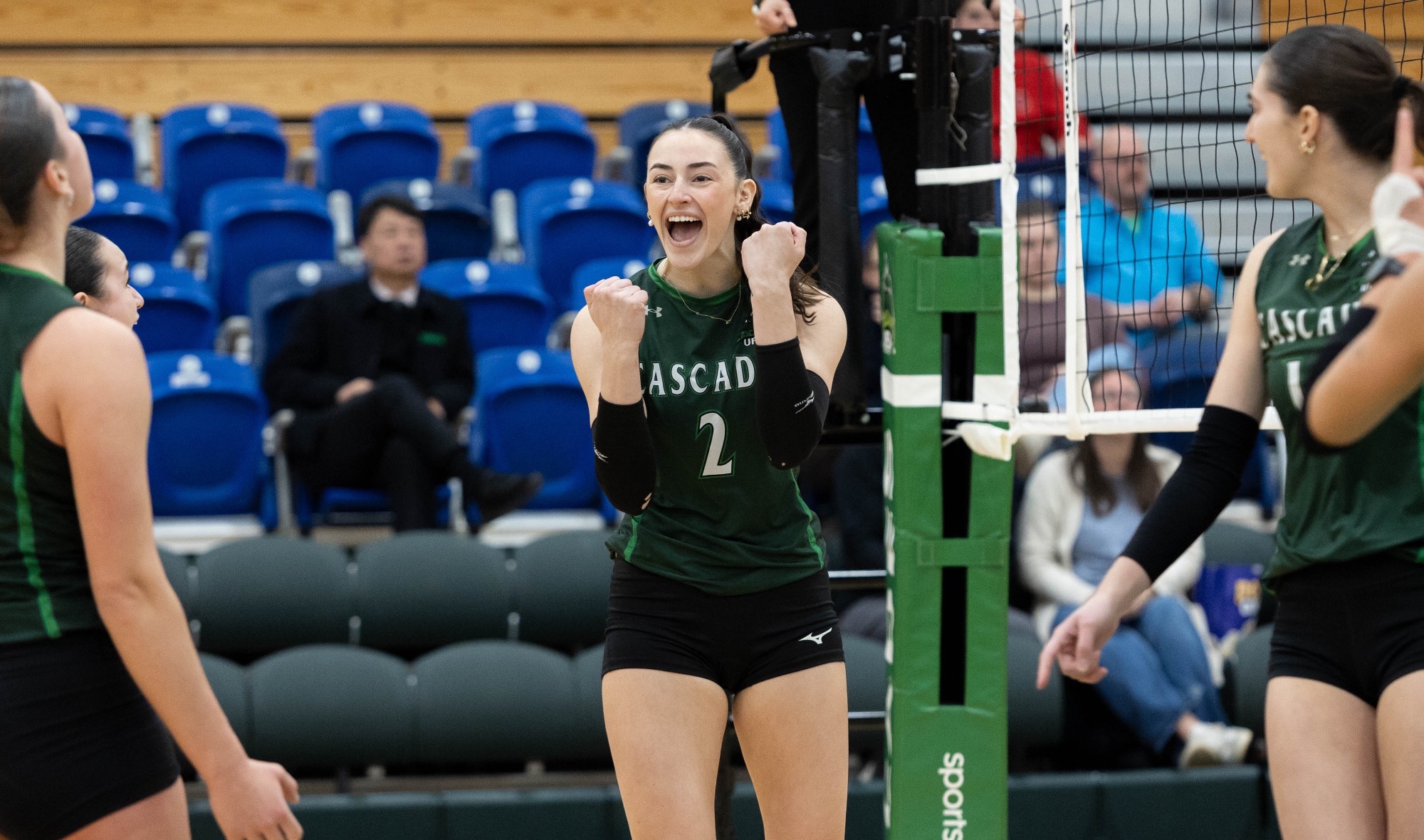 Aubrey Gingles celebrates during a point against MacEwan