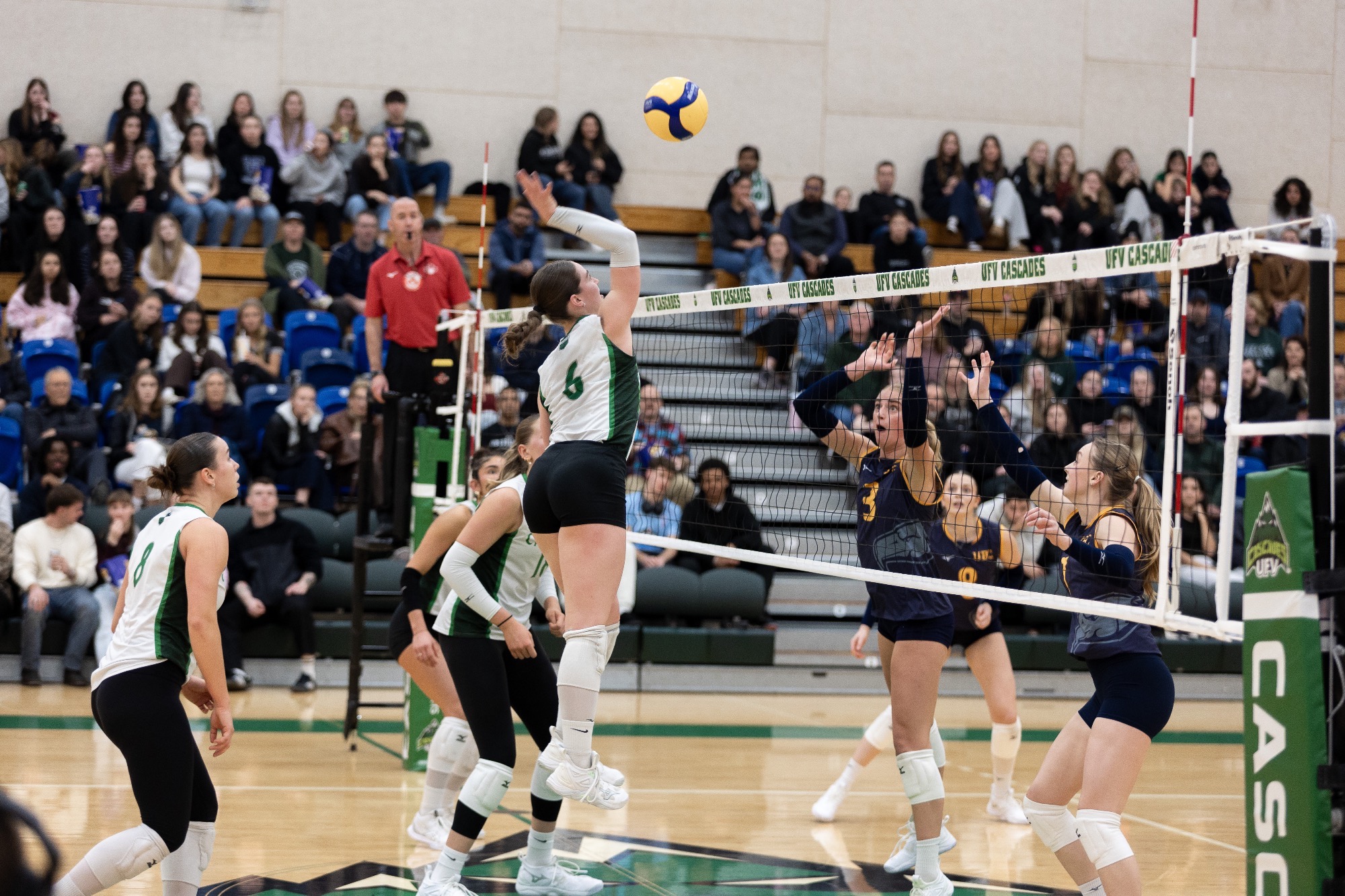 Lauren Attieh hits the ball against UBC
