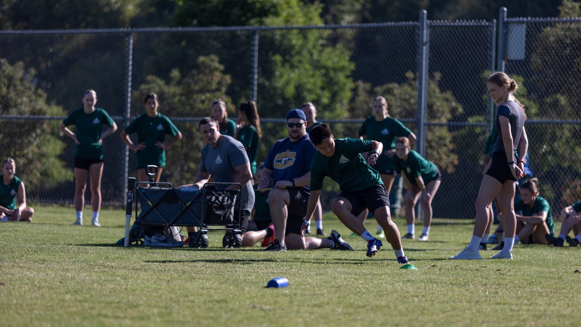 Addy Chen goes through testing while supervised by the S&C team