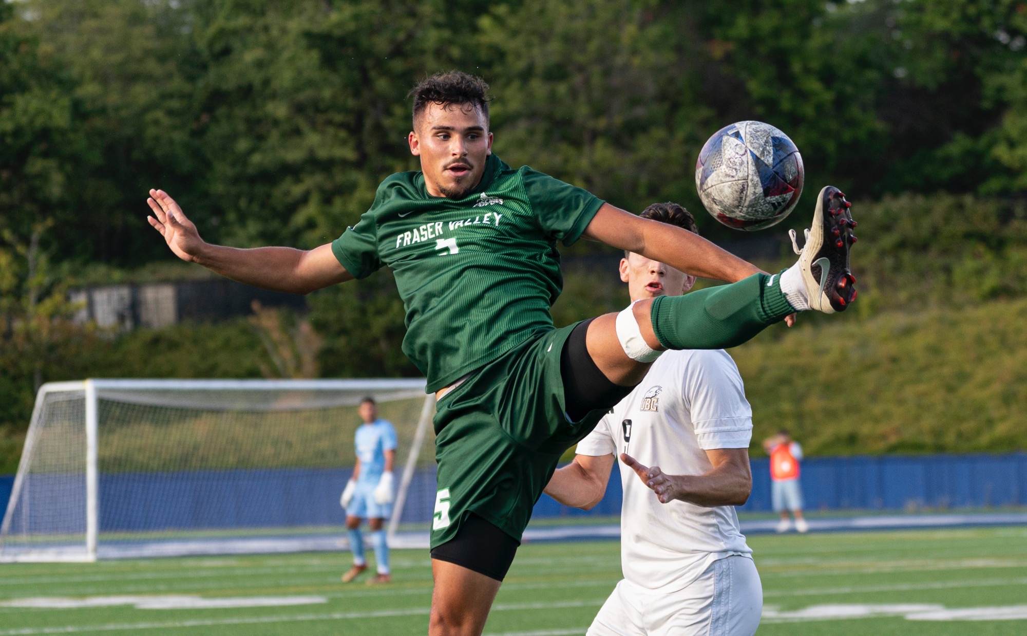 Kyle Torresan takes the ball down against UBC