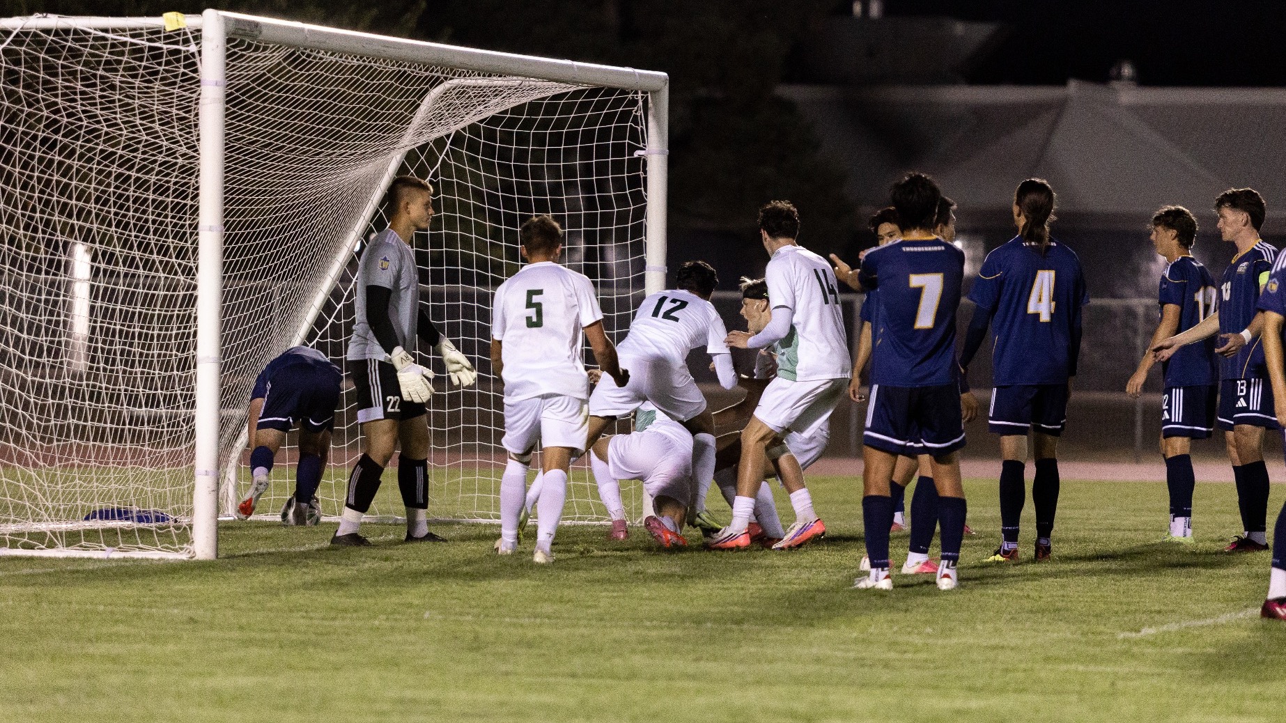 The Cascades celebrate Michael Beecroft's goal against UBC