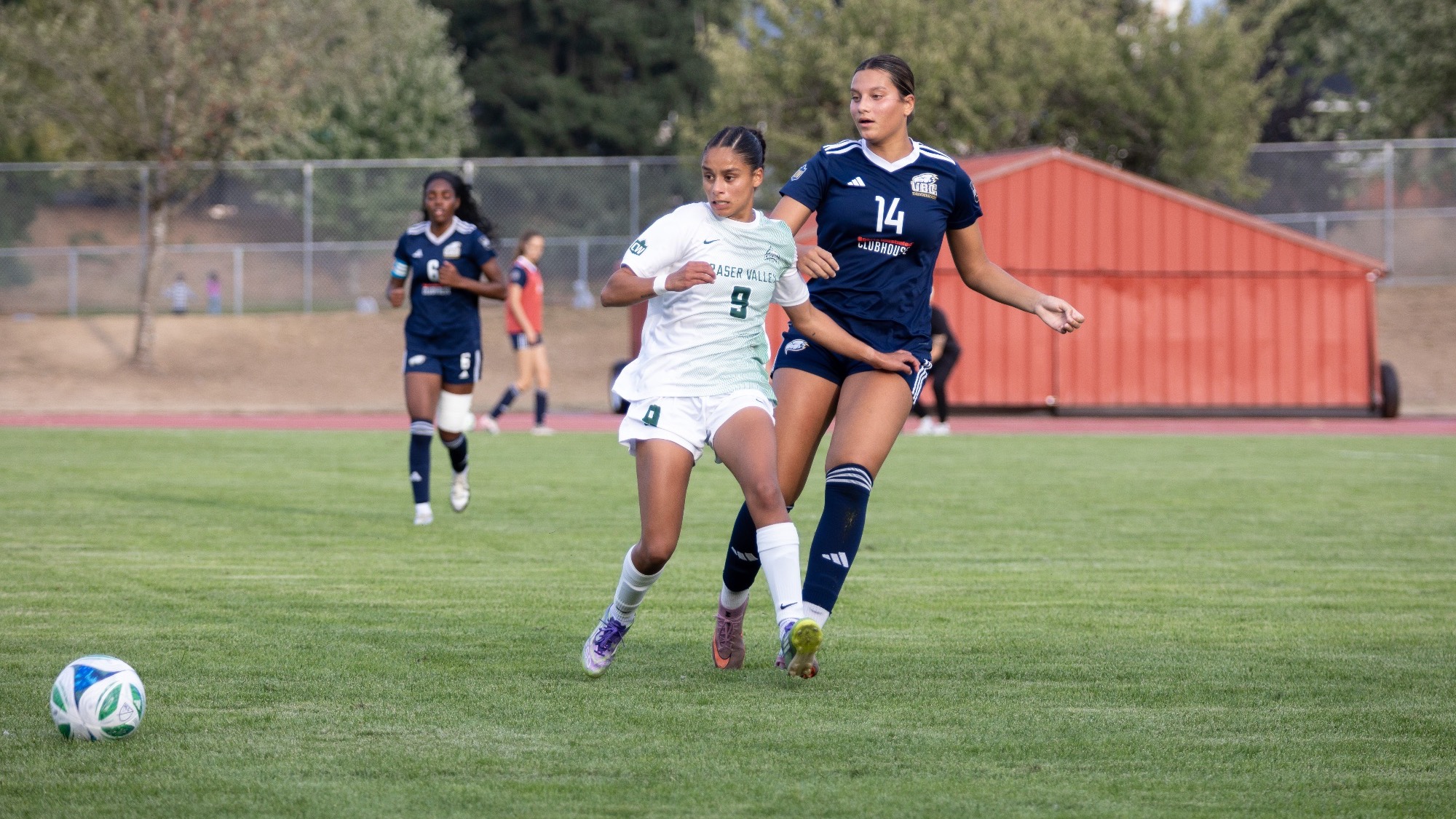 Eesha Mudaliar battles for the ball against UBC