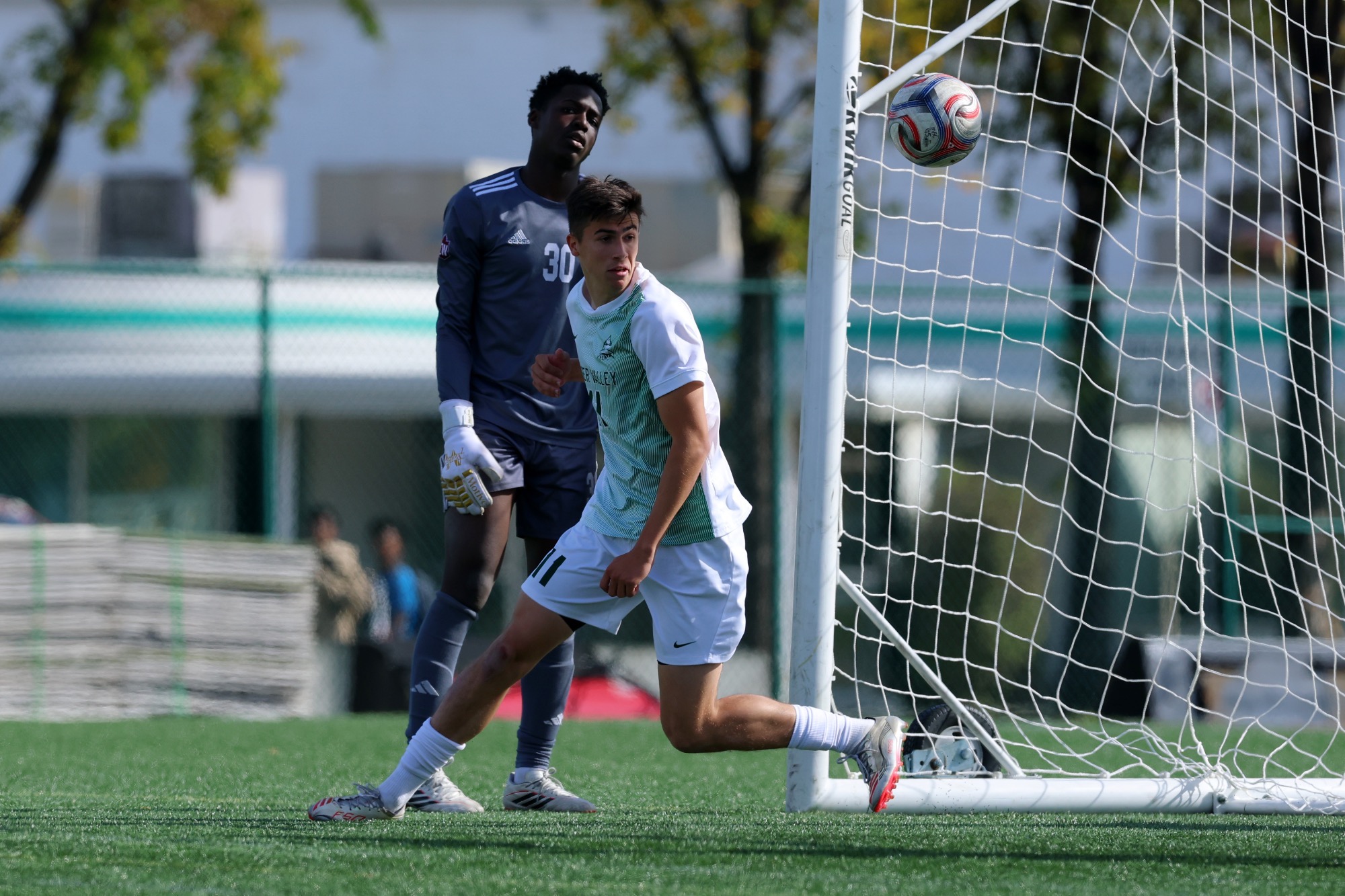 Kevin Mailand scores the game tying goal past GMU keeper David Sithole