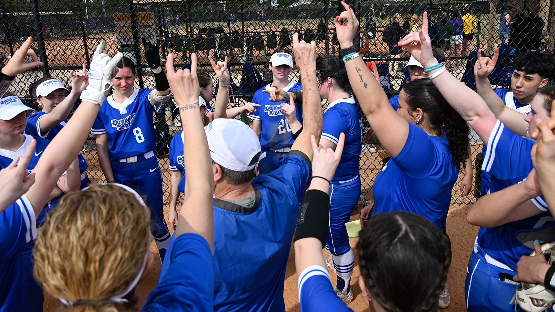 Softball team huddle