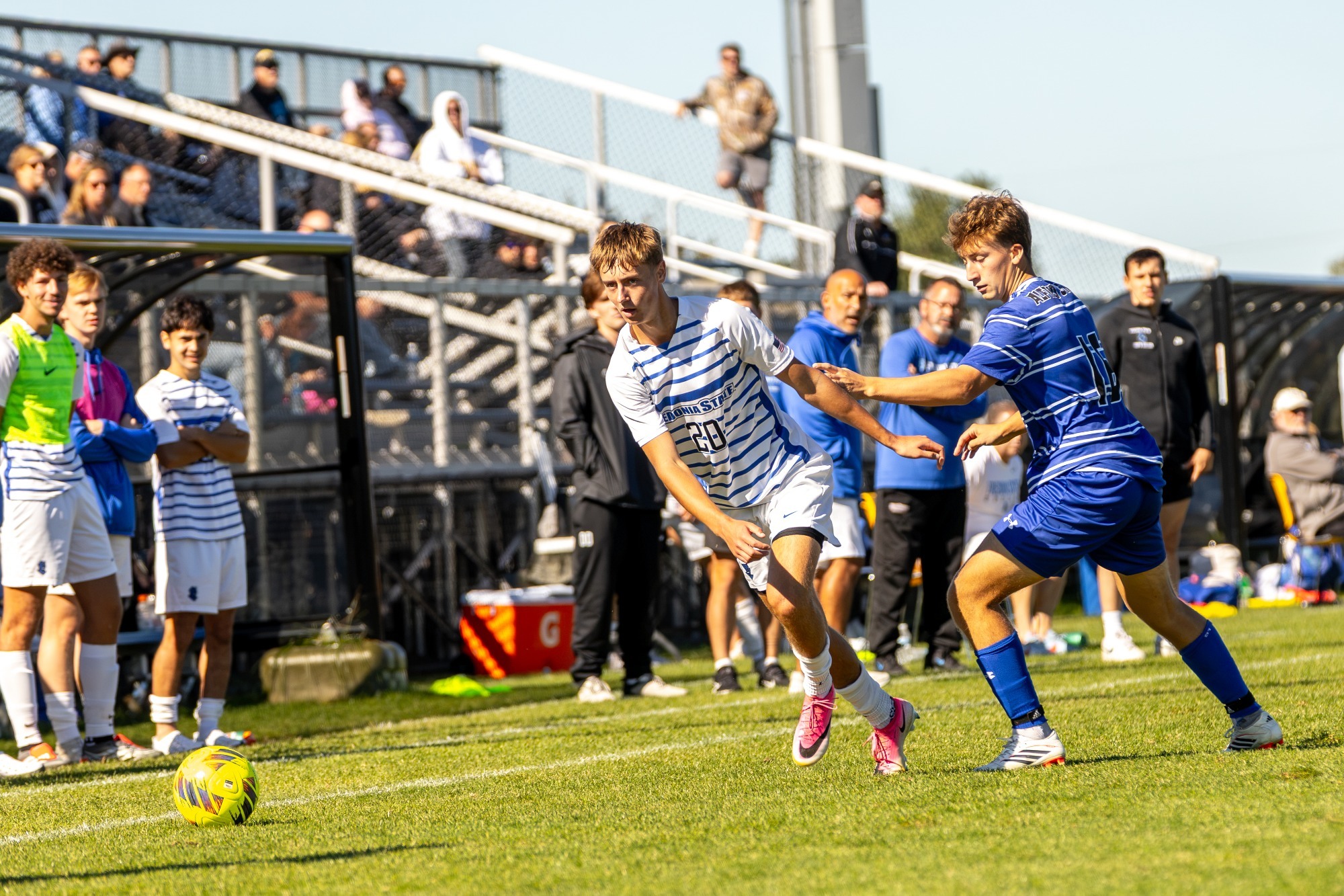 Jackson Kuby dribbles up the sideline against Alfred State