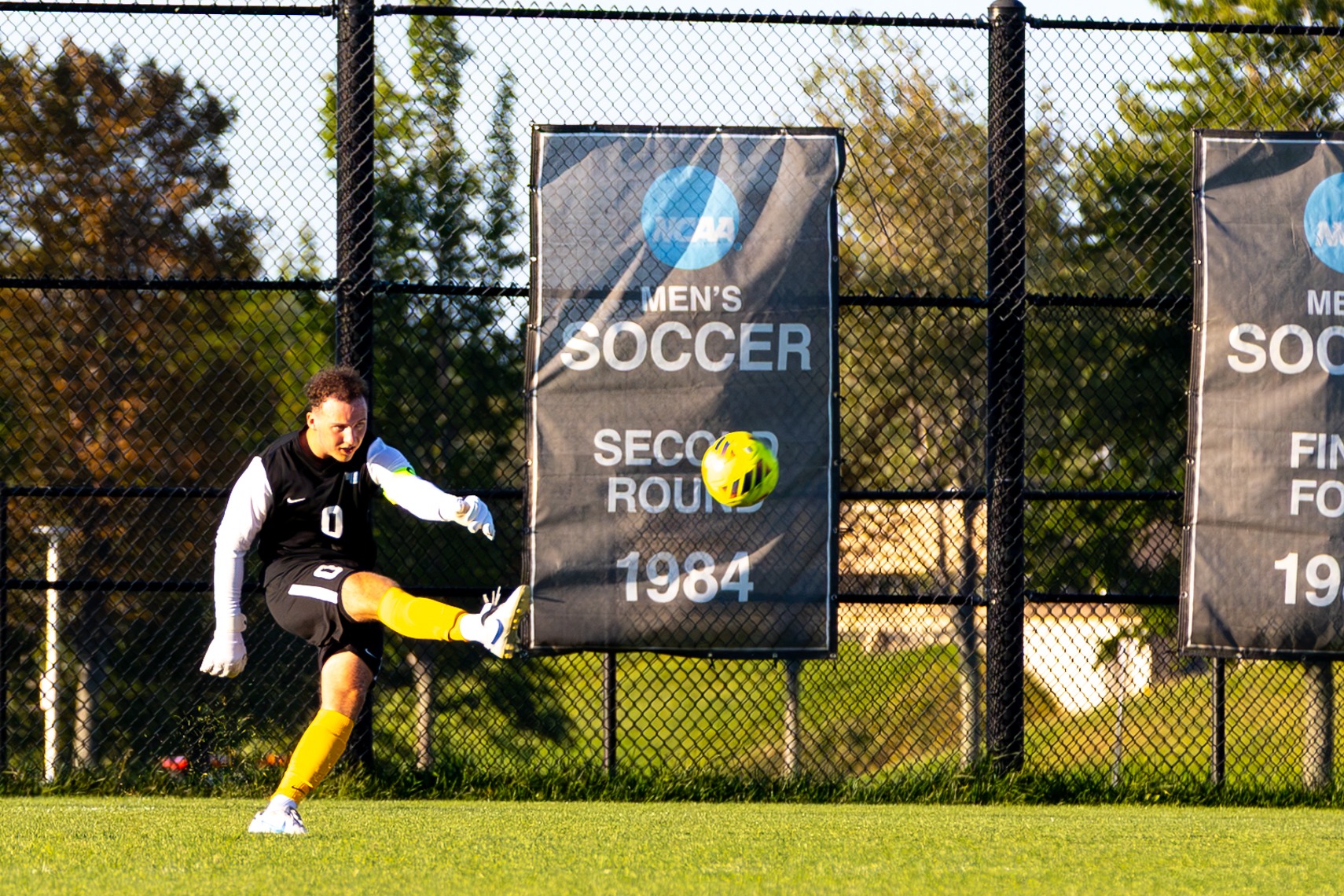 Goalkeeper Thomas McDonald kicks the ball