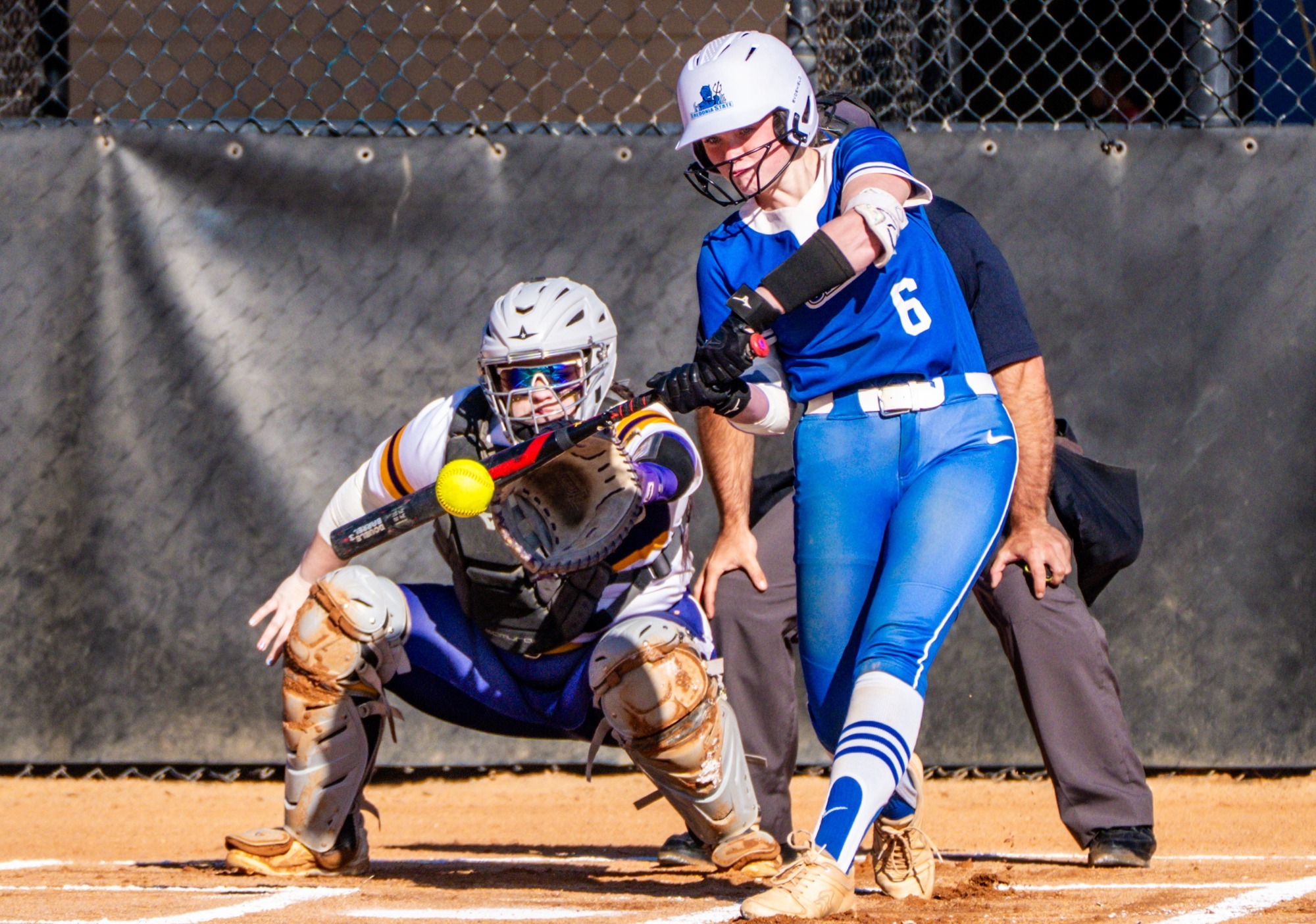 Maddy DeVore hits the ball to right field