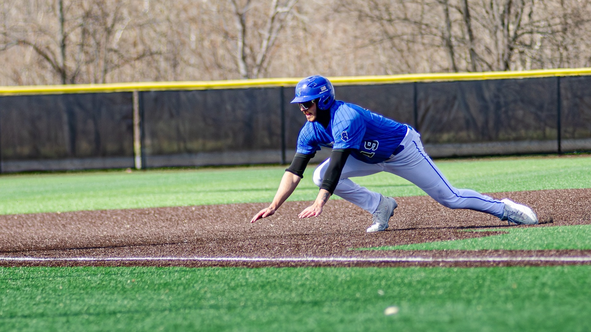Domenic Hickok diving sliding to third