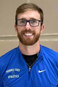 Portrait of Ryan Kreuser, head coach of Fredonia State swimming and diving