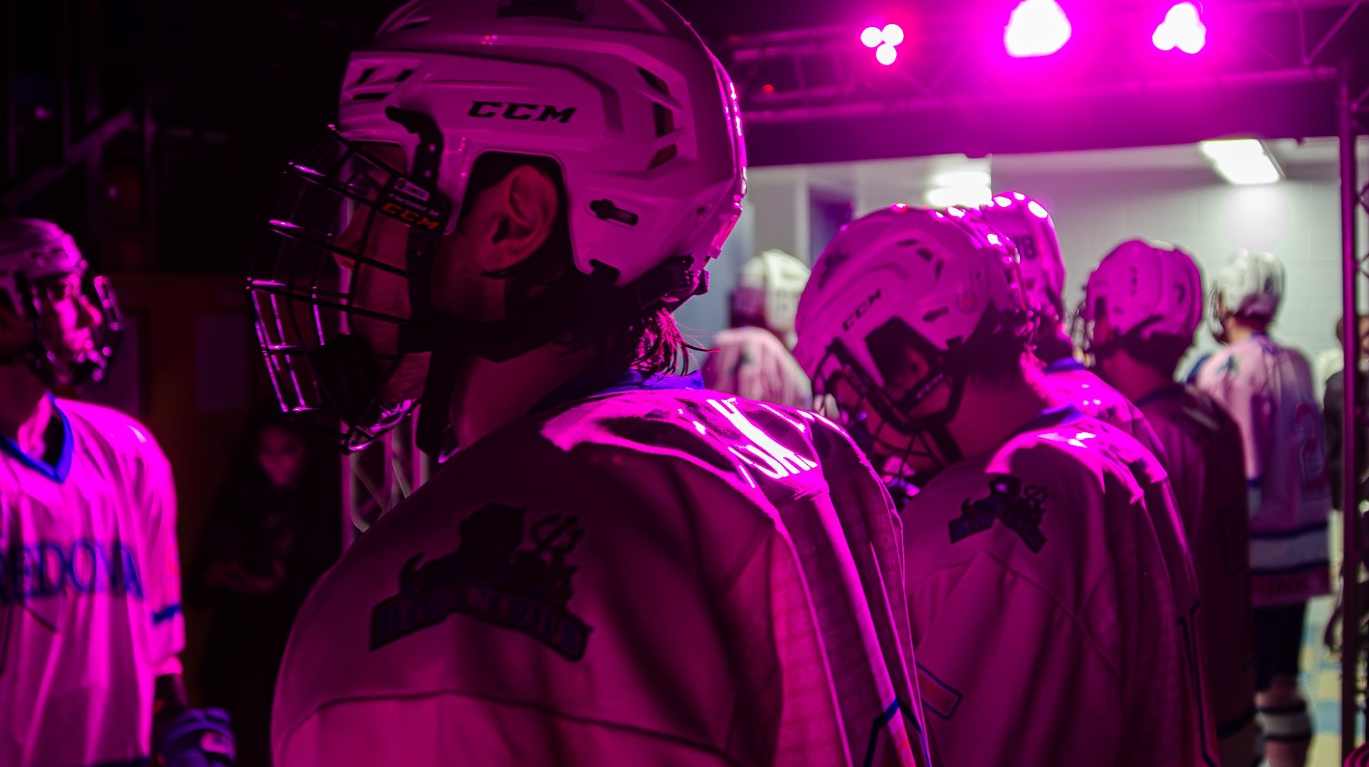 Members of the Fredonia State men's hockey team leave the locker room prior to their 2026 Pink The Rink game