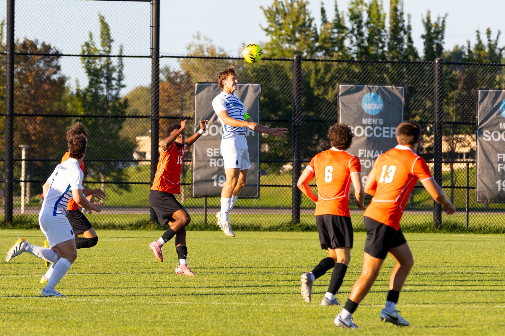 Lee Hartke heads the ball