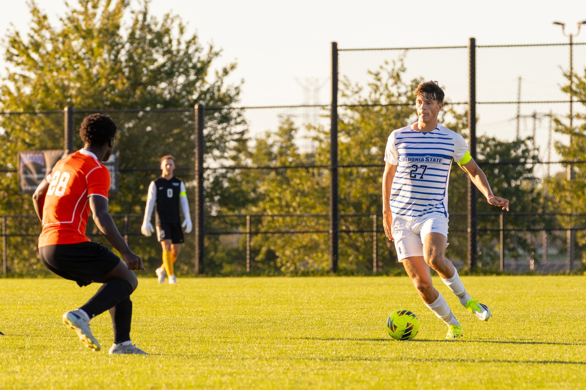 Ryan Ameis dribbles the ball 