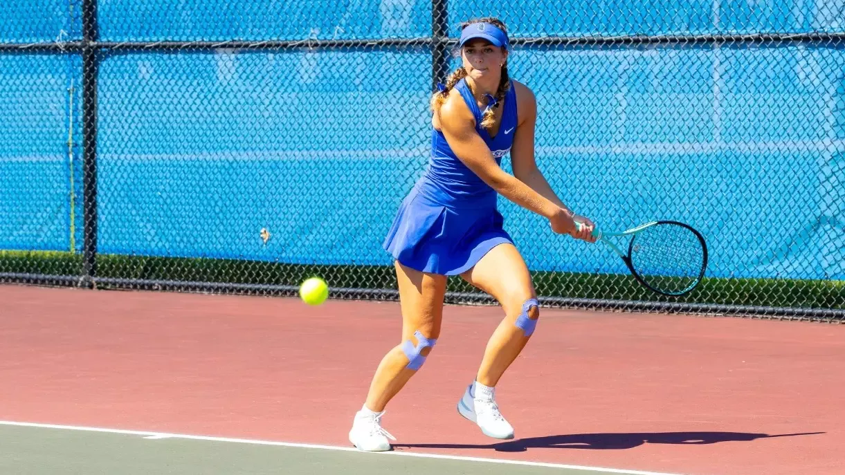 No.  1 singles player Lucy Prevet makes a left-handed backhand baseline return Sept. 5 vs. Brockport