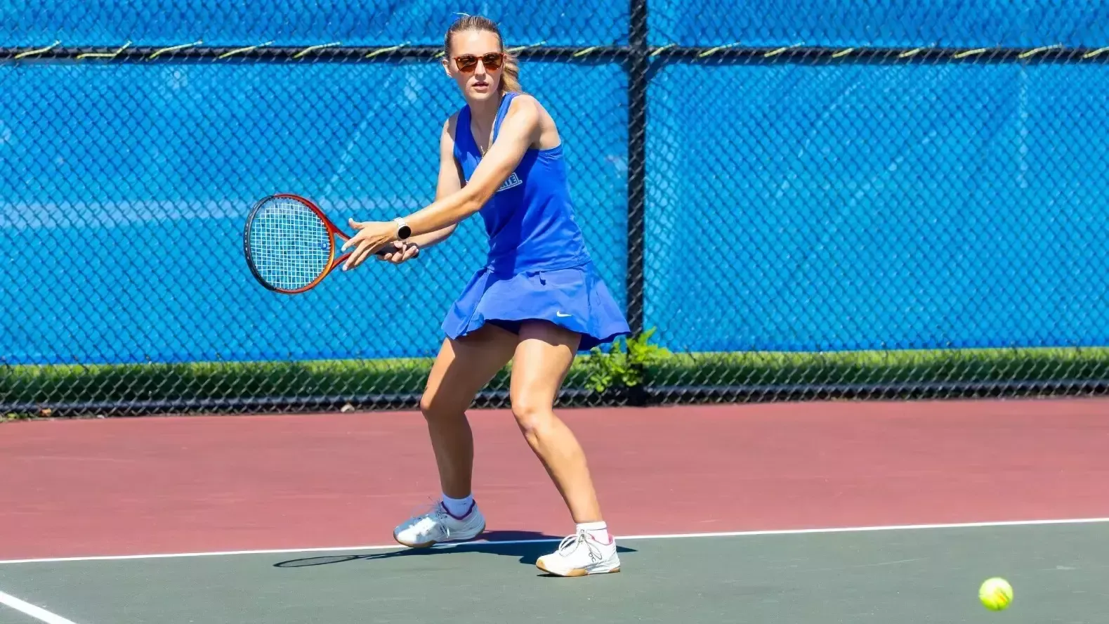 Third singles player Rylyn Tunstall making a forehand baseline shot Sept. 5, 2026, vs. Brockport