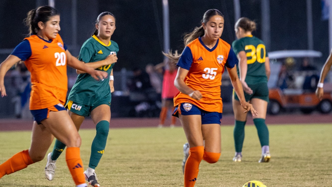 jayah and sophie racing for the ball