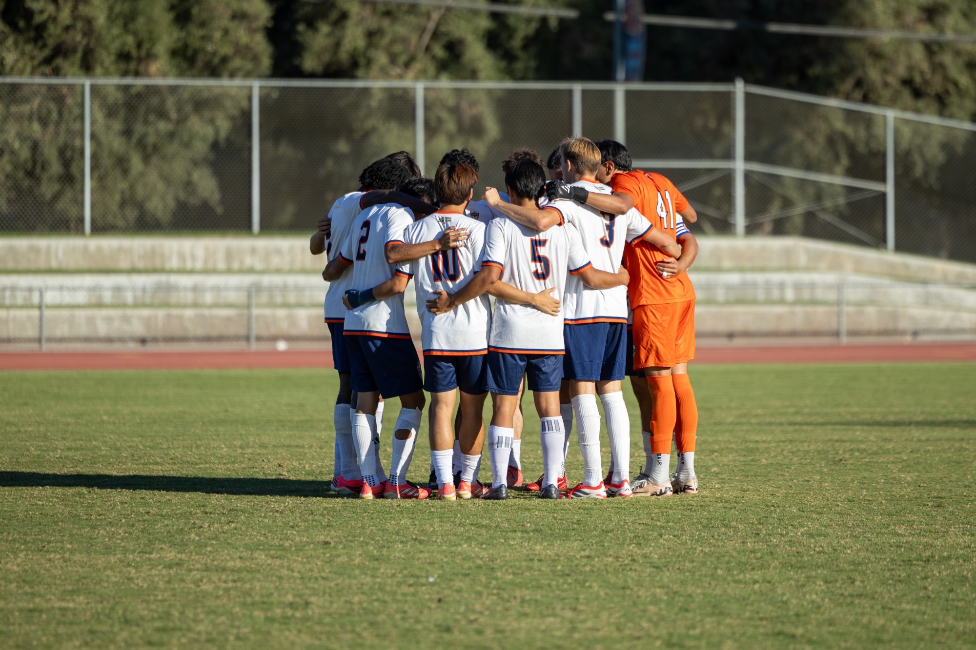 mens soccer team huddle 2026