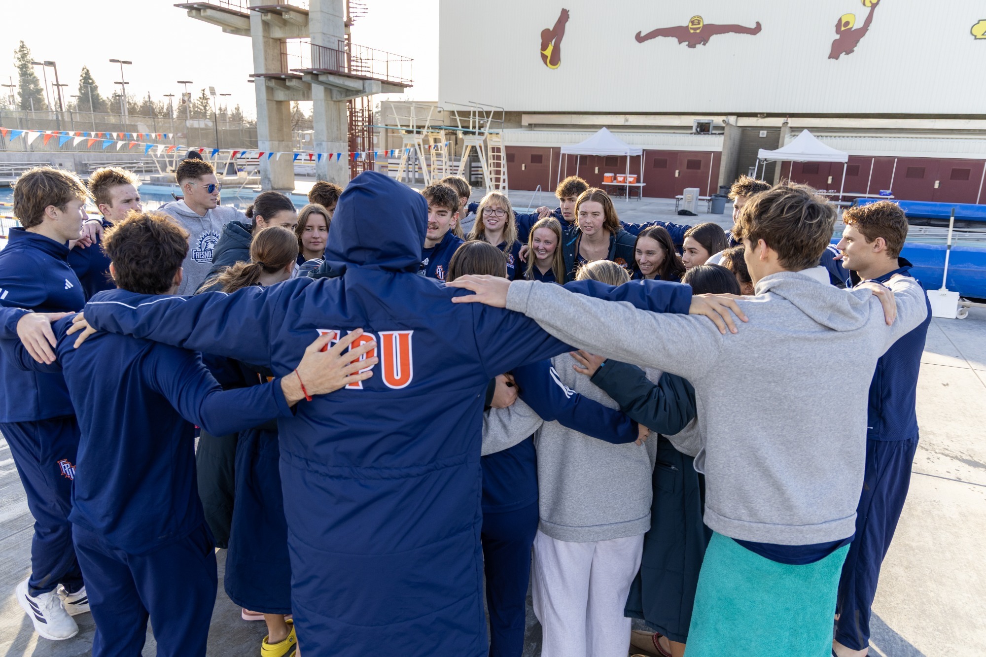 swim in senior huddle