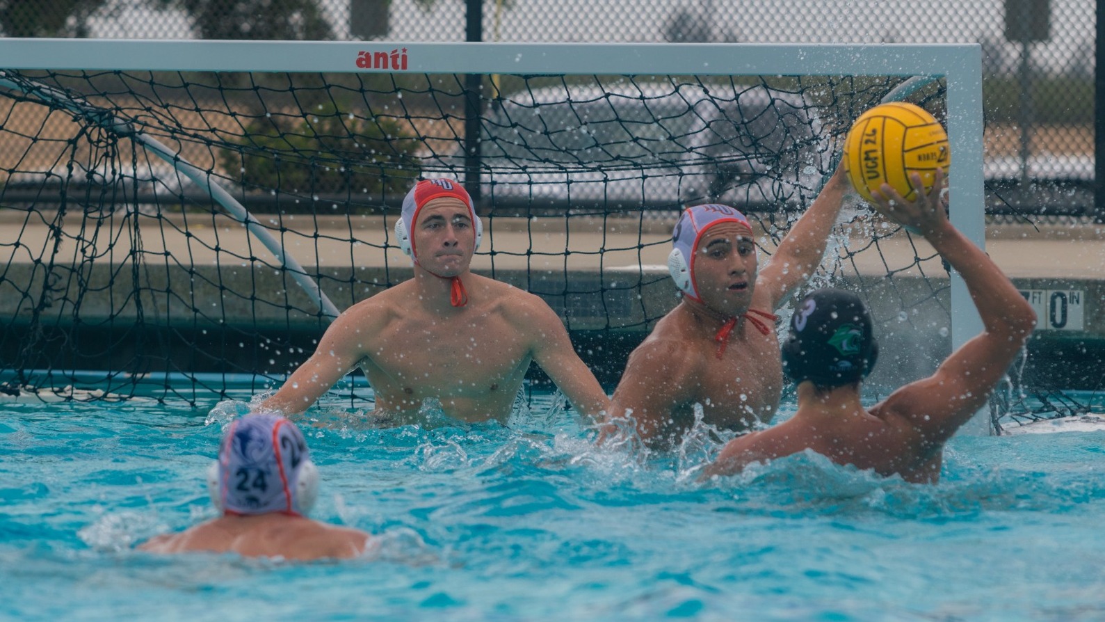 mens water polo defending against Cuesta