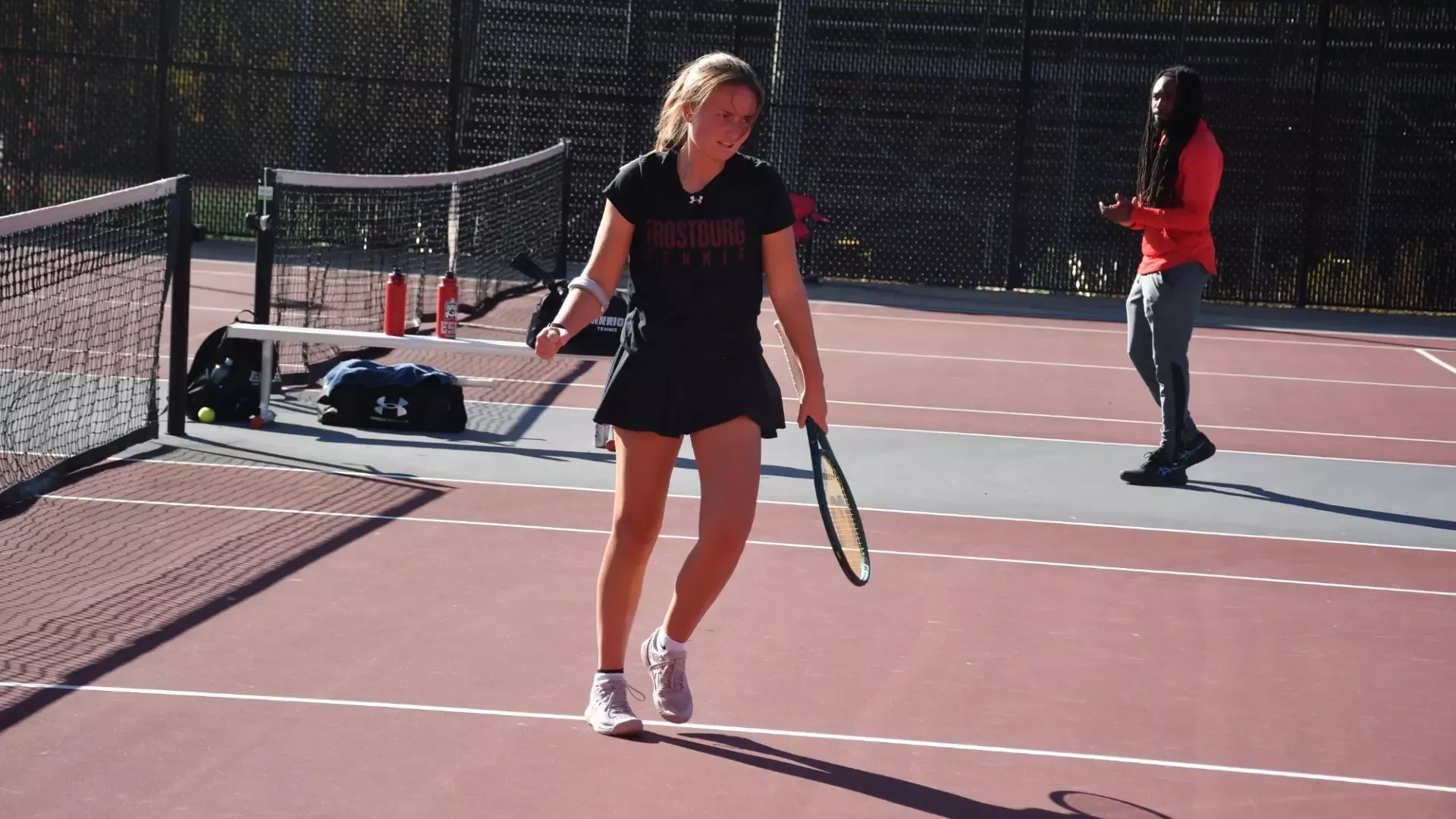 Frostburg women's tennis player, Julia Ramos Bentham celebrates versus East Stroudsburg University.