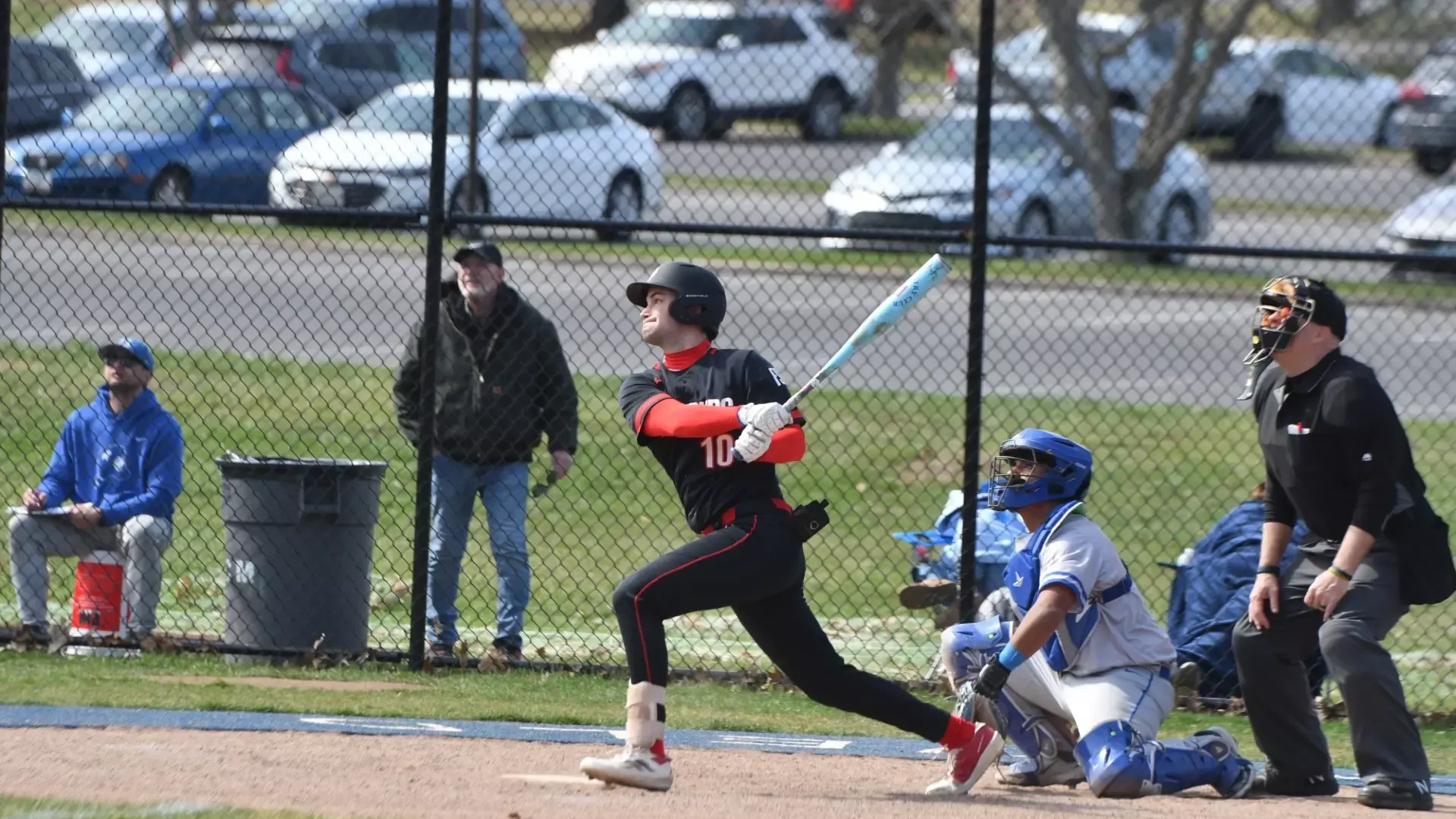 Frostburg baseball player, number 10, Jake Holler Swing bat swing at home plate versus Glenville State University.